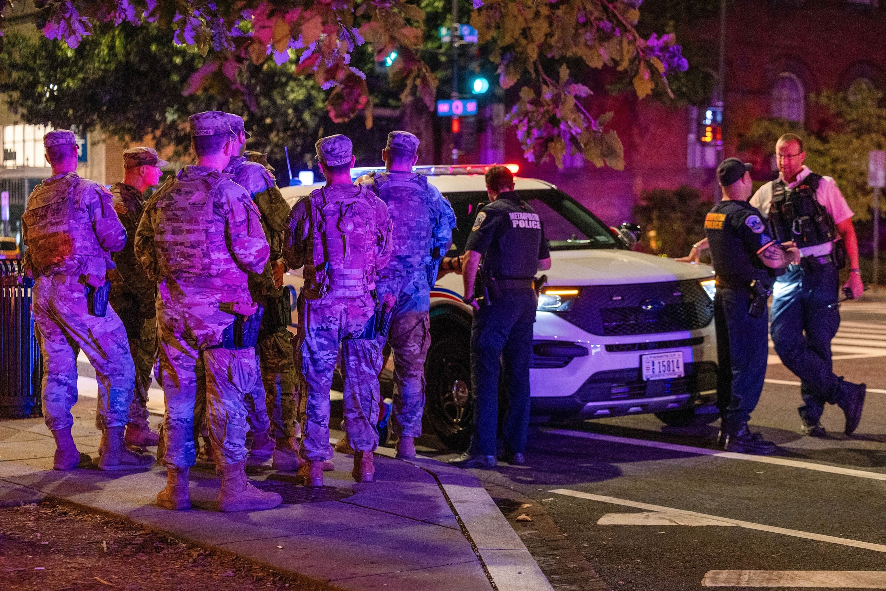 PHOTO: National Guard Members patrol 14th Street, working alongside  Washington DC Metro police and the FBI on August 25, 2025 in Washington, DC.