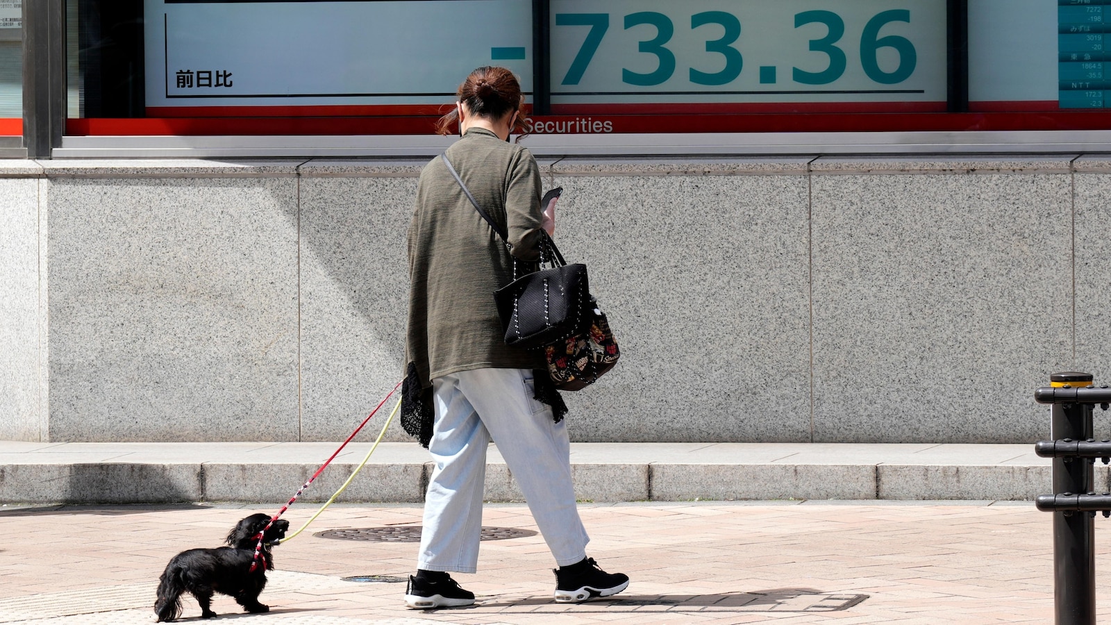  Stock market today: Asian shares track Wall Street slump triggered by strong US spending data