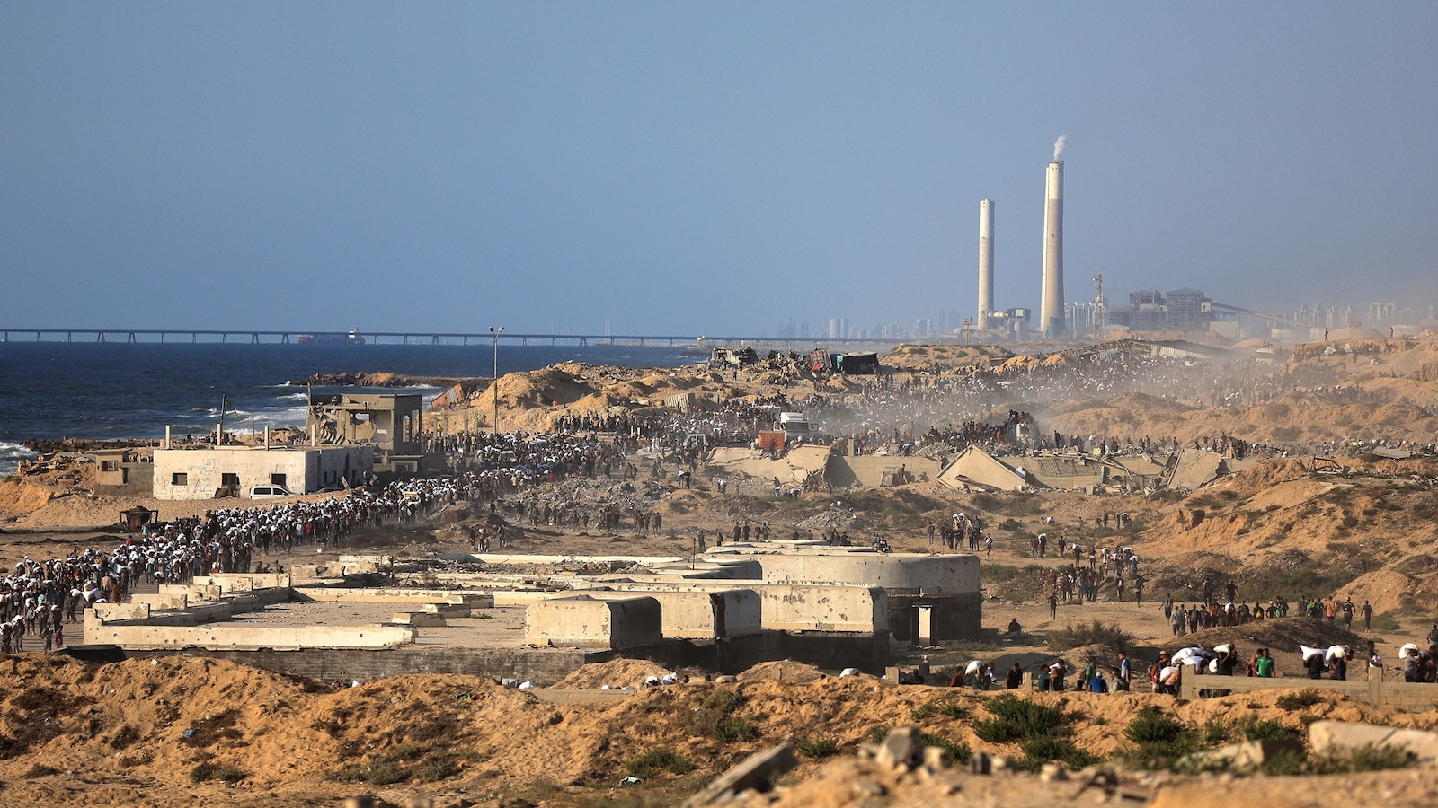 Israeli Fire Kills 70+ Palestinians Seeking Aid Amid Gaza Famine