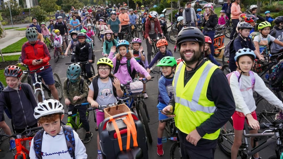 WATCH:  ‘Bike bus’ movement gains traction, drawing kids and celebrities