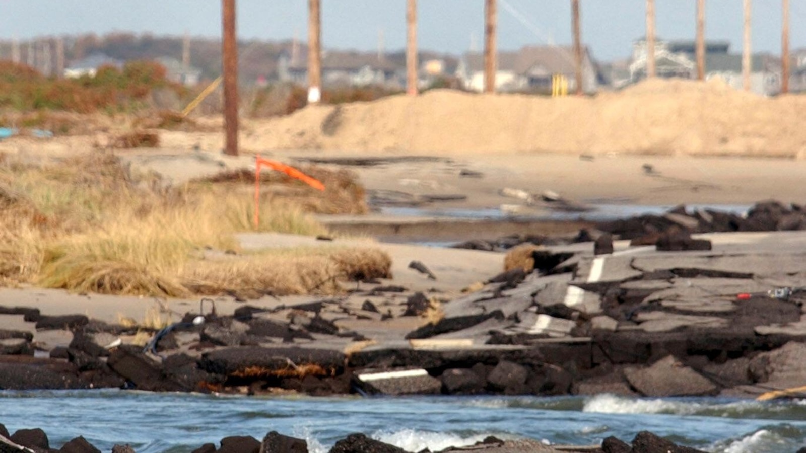 Hurricane Erin's massive waves threaten to isolate North Carolina's Outer Banks