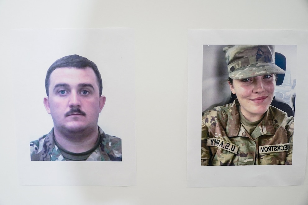 PHOTO: Pictures of National Guard members Andrew Wolfe and Sarah Beckstrom are displayed at a press conference, after they were shot in Washington, D.C., Nov. 27, 2025. 
