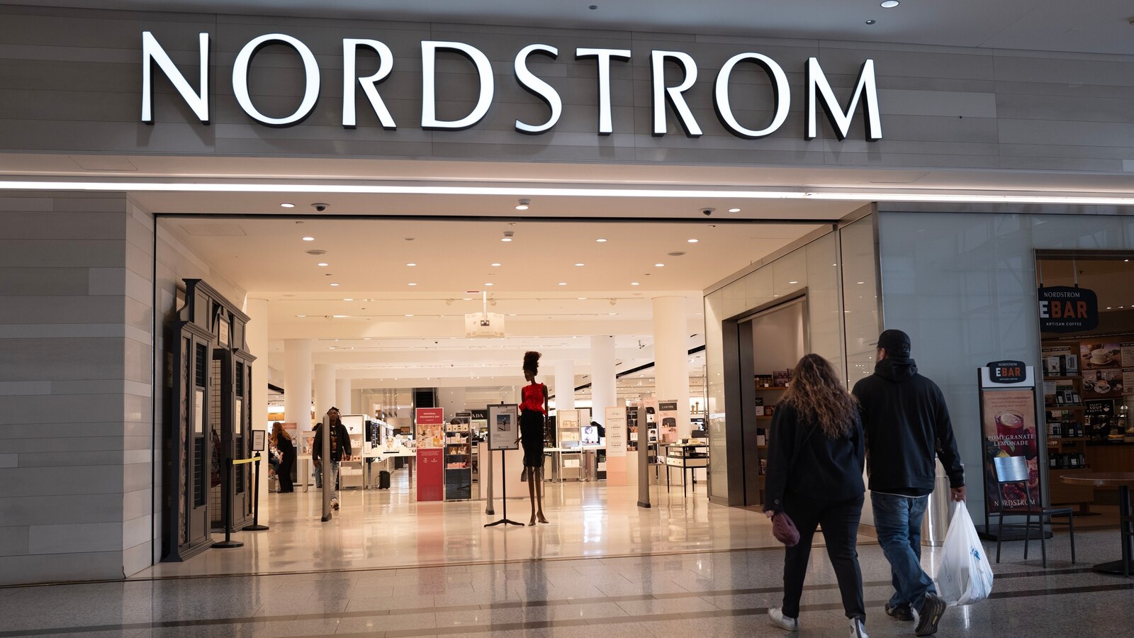 A sign marks the location of a Nordstrom store in a shopping mall, March 20, 2024, in Chicago.
