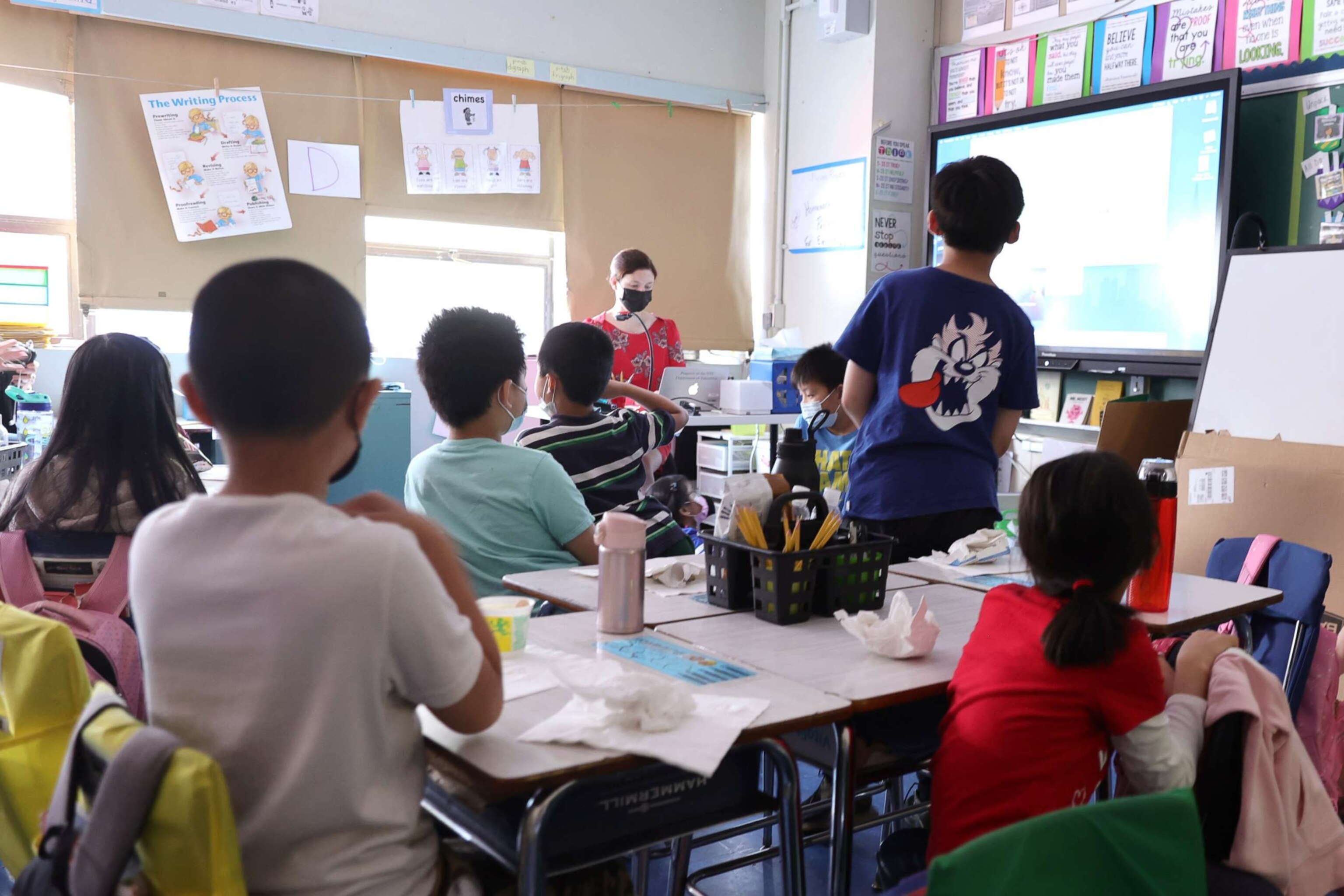 PHOTO: Students attend class on the second to last day of school as New York City public schools prepare to wrap up the year at Yung Wing School P.S. 124, June 24, 2022, in New York.