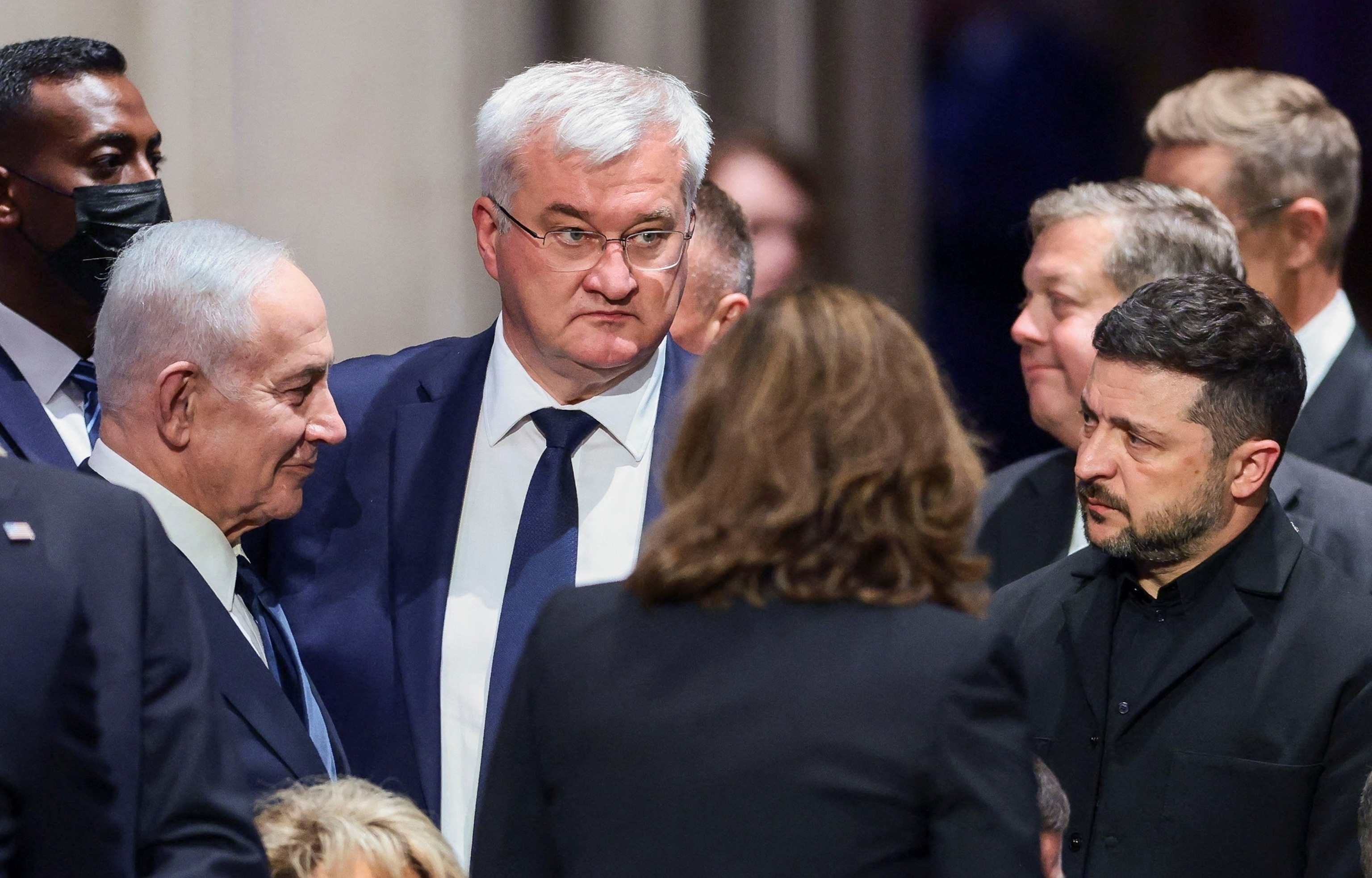 PHOTO: Israeli Prime Minister Benjamin Netanyahu greets Ukrainian President Volodymyr Zelenskiy and Ukrainian Foreign Minister Andrii Sybiha at the funeral service for Sen. Lindsey Graham at Washington National Cathedral in Washington, July 28, 2026. 