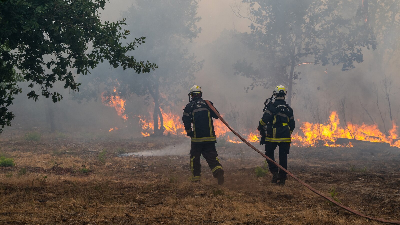 Massive forest fires have forced the evacuation of nearly 200,000 people in southwestern France and central Spain, with residents fleeing towns near Madrid and 