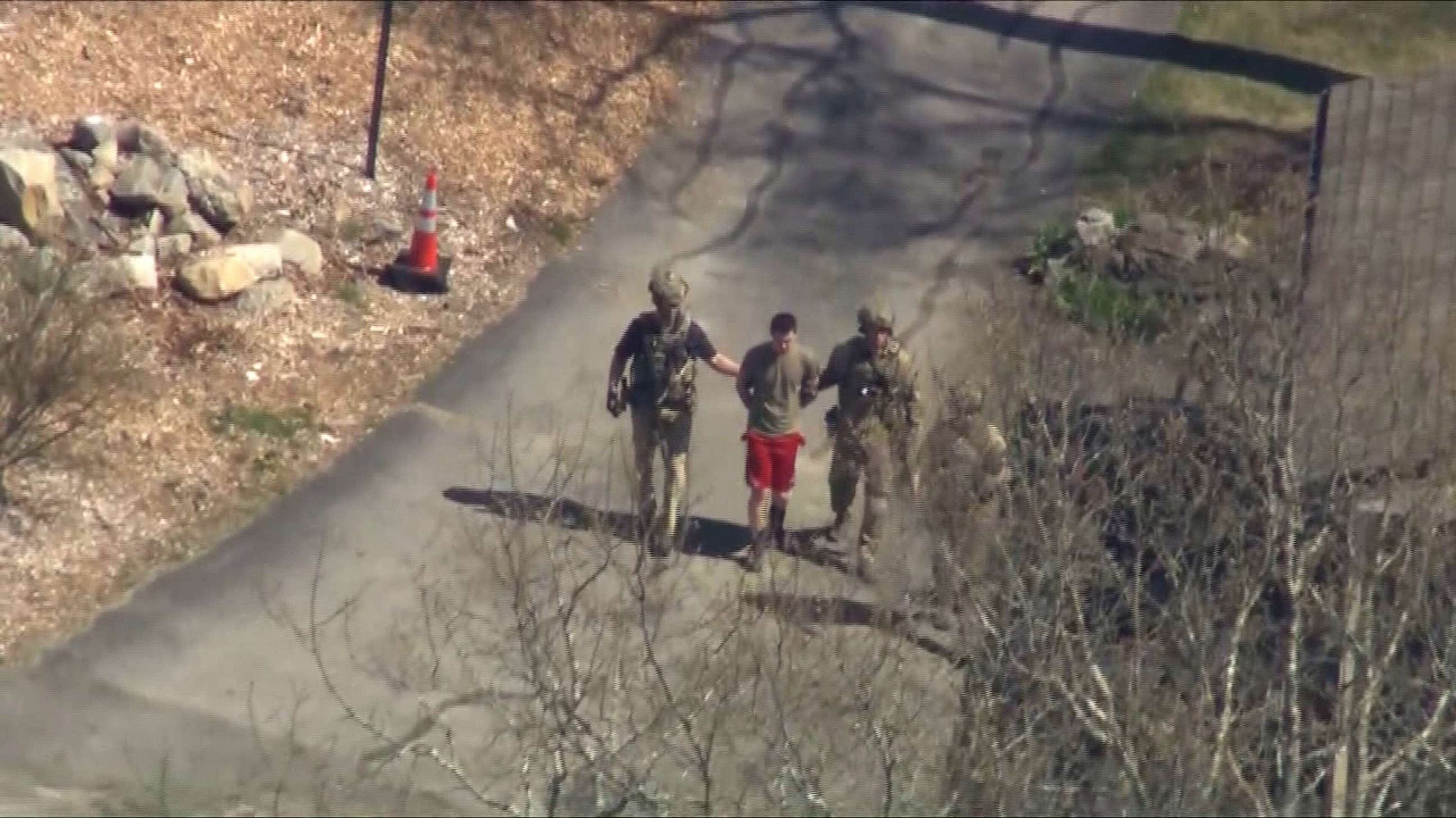 PHOTO: Suspected classified document leaker and U.S National Guardsman, Jack Teixeira, is taken into custody by FBI agents in North Dighton, Mass., April 13, 2023.