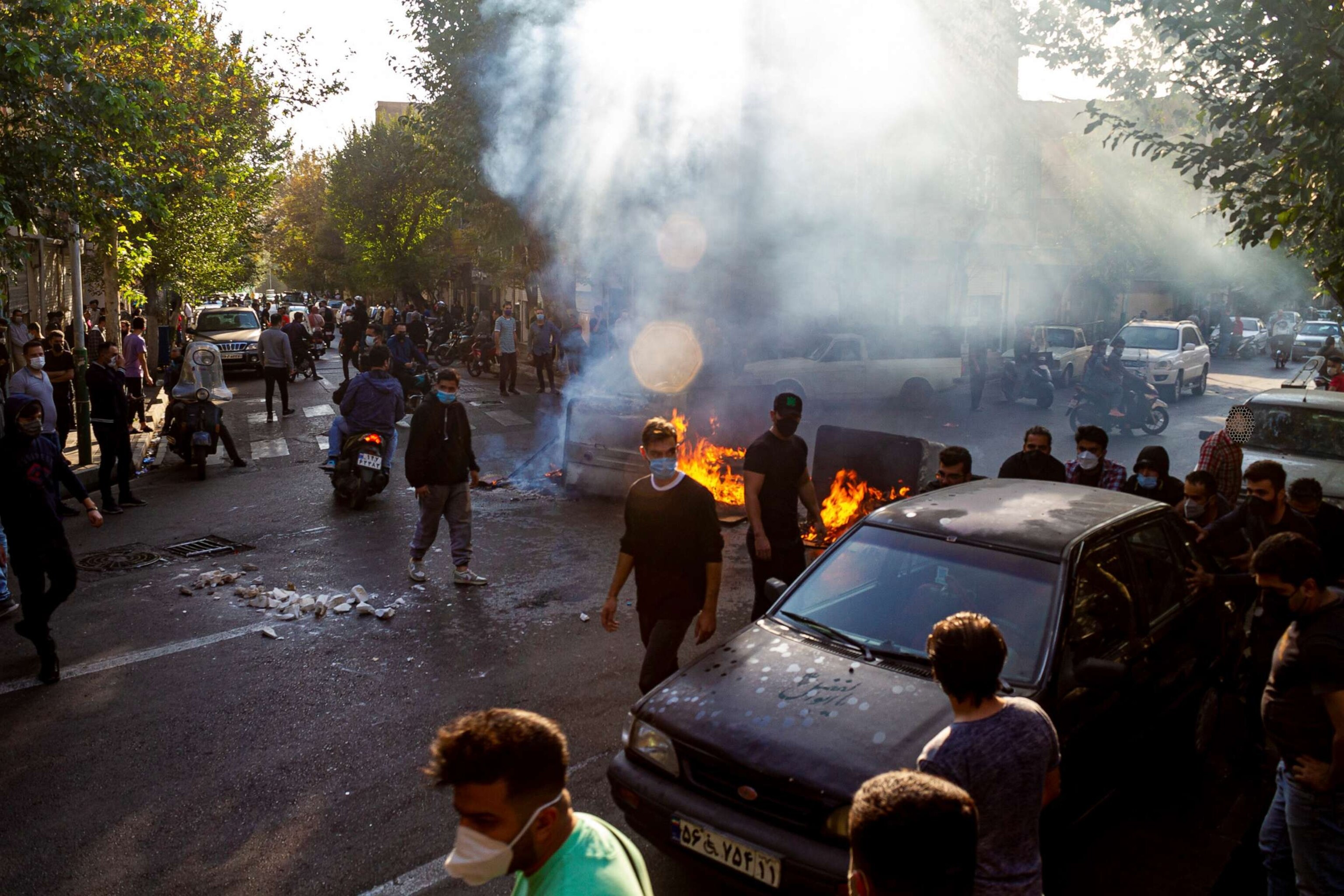 PHOTO: Iranians protests the death of 22-year-old Mahsa Amini after she was detained by the morality police last month, in Tehran, Oct. 27, 2022.