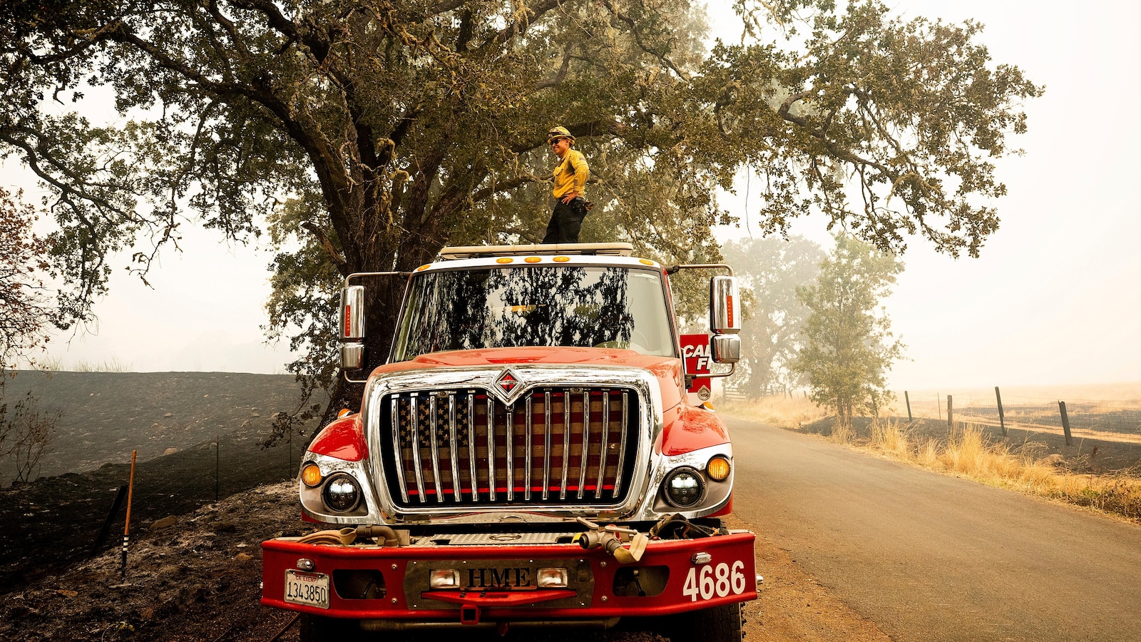 Firefighters and weather are stabilizing Oregon wildfire. Flames so far spare California wineries