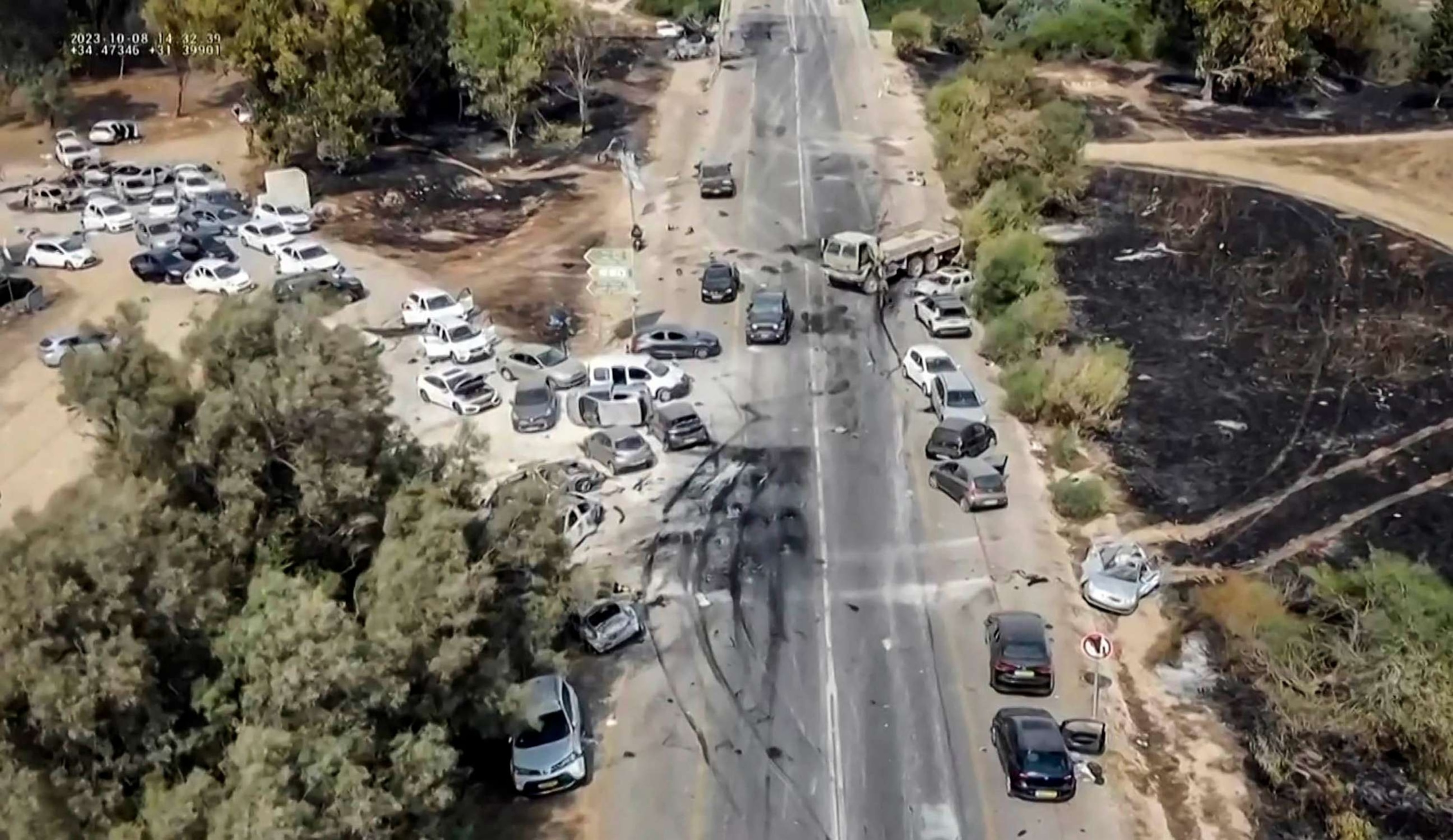 PHOTO: A grab taken from a UGC video posted on the Telegram channel "South First Responders", Oct. 9, 2023, shows the aftermath of an attack on the Supernova music Festival by Palestinian militants, near Kibbutz Reim in