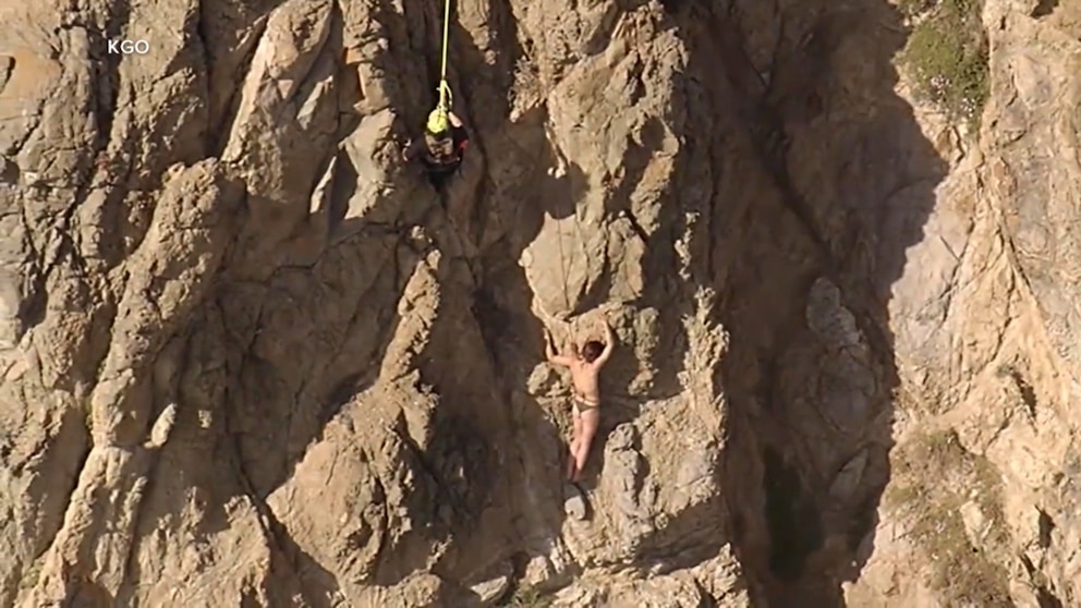 Video Rescue of woman clinging to cliff caught on camera