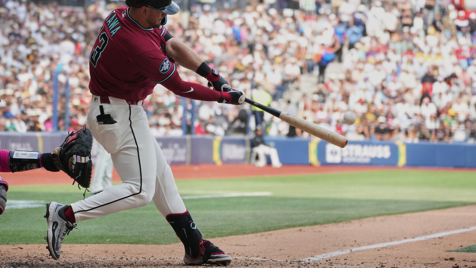 Tawa's slam helps Diamondbacks rally from 5-run deficit to beat Padres 12-7 in Mexico City