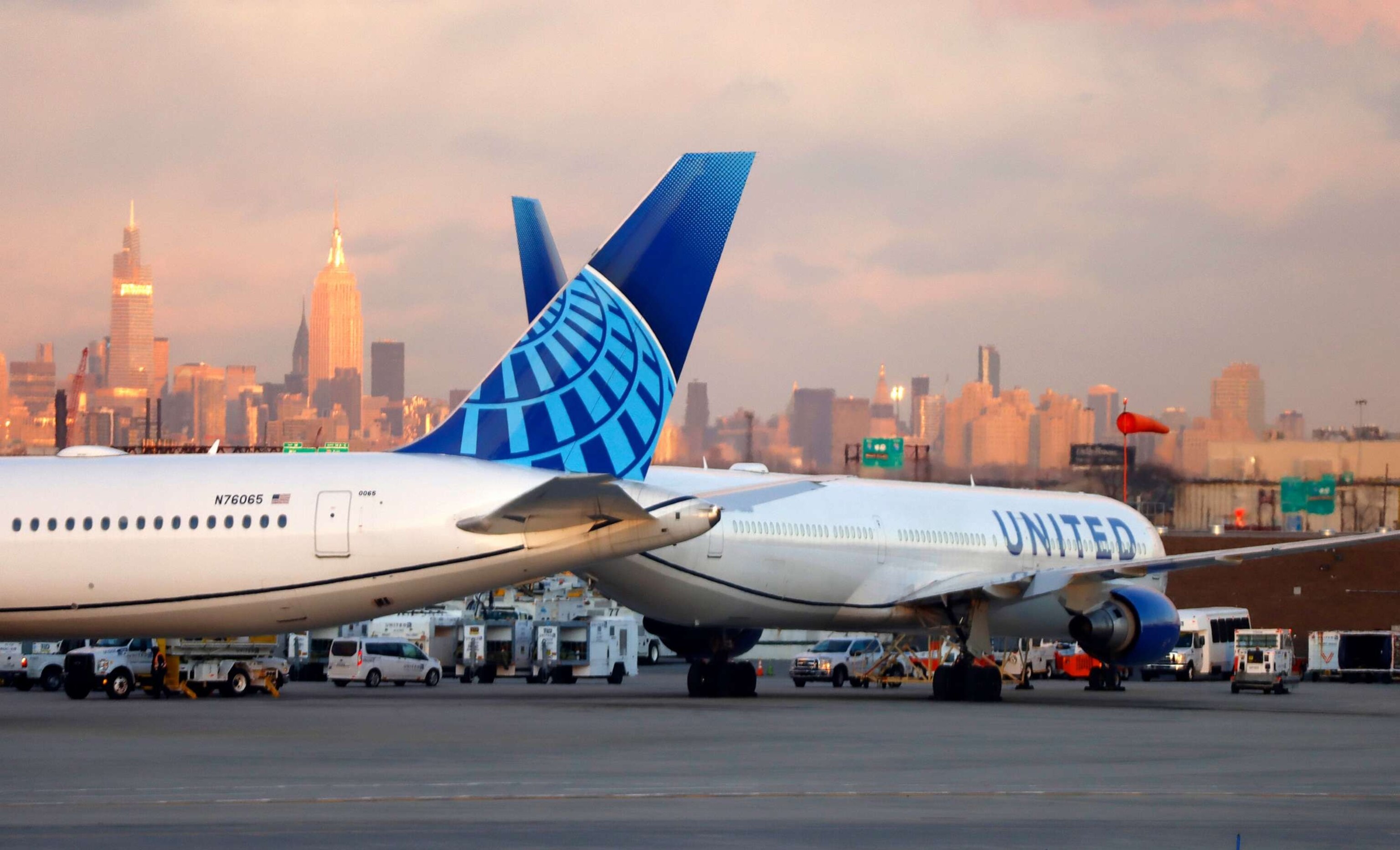 PHOTO: United Airlines airplanes sit on the tarmac at Newark Liberty Airport in front of the Empire State Building in New York City on Feb. 3, 2023, in Newark, N.J.