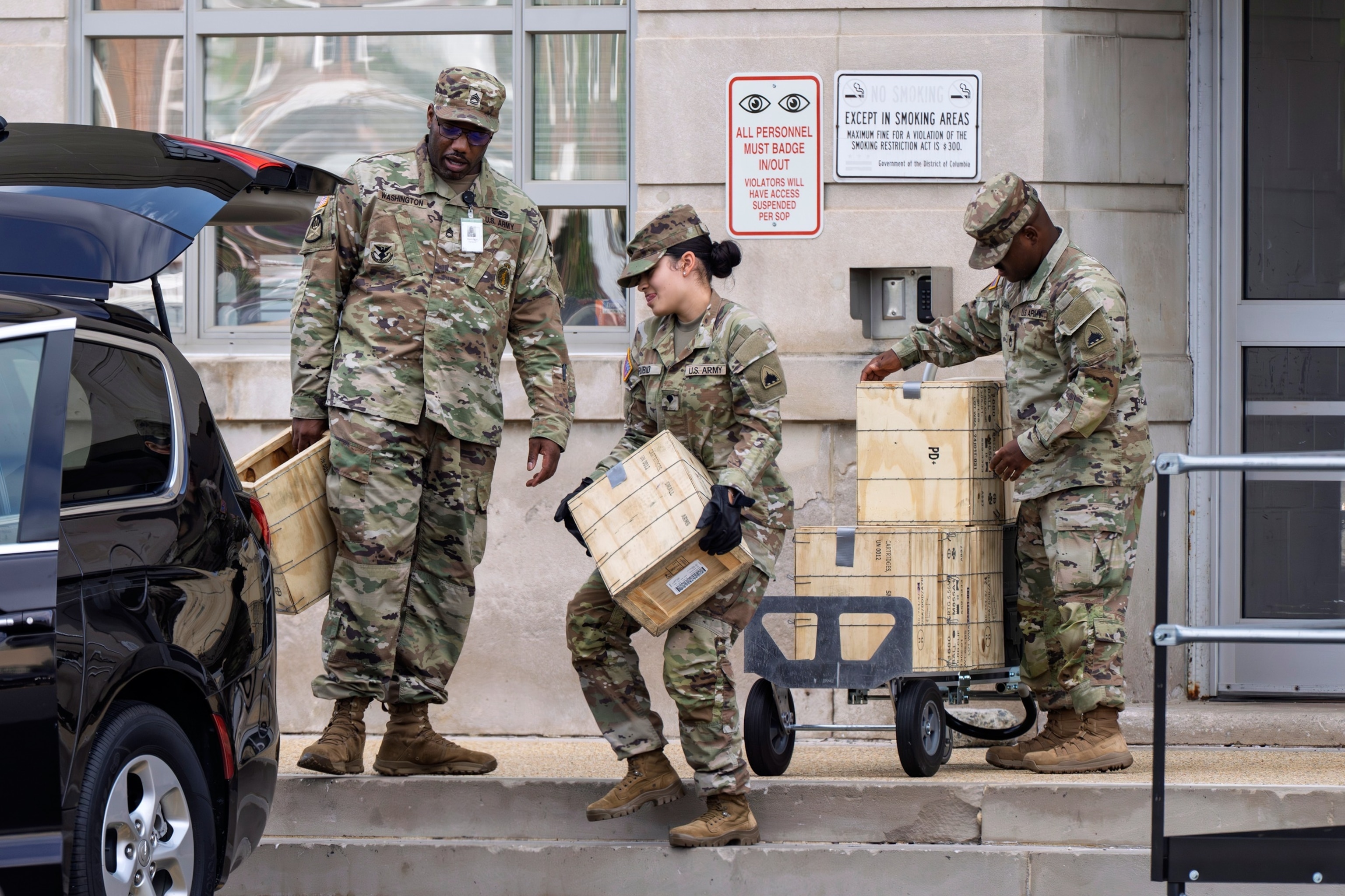 PHOTO: Troops load boxes of rifle ammunition at the District of Columbia National Guard Headquarters as President Donald Trump implements his order to use federal law enforcement and the National Guard in Washington, D.C., Aug. 12, 2025