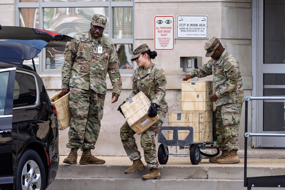 PHOTO: Troops load boxes of rifle ammunition at the District of Columbia National Guard Headquarters as President Donald Trump implements his order to use federal law enforcement and the National Guard in Washington, D.C., Aug. 12, 2025