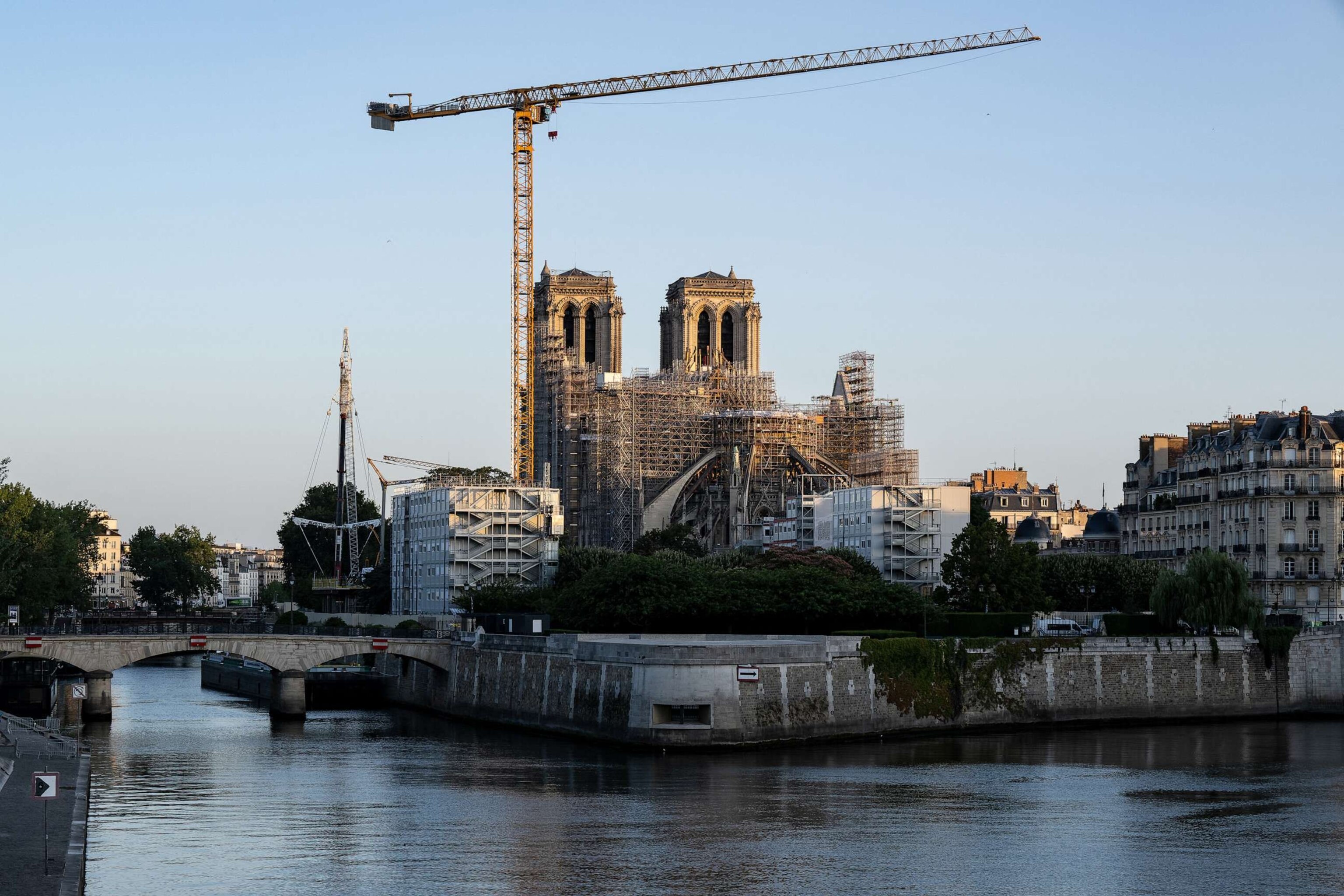 PHOTO: Cranes next to Notre-Dame de Paris Cathedral in Paris, as restoration work continues after the fire in 2019 that partially destroyed the upper part of the cathedral, July 17, 2023.