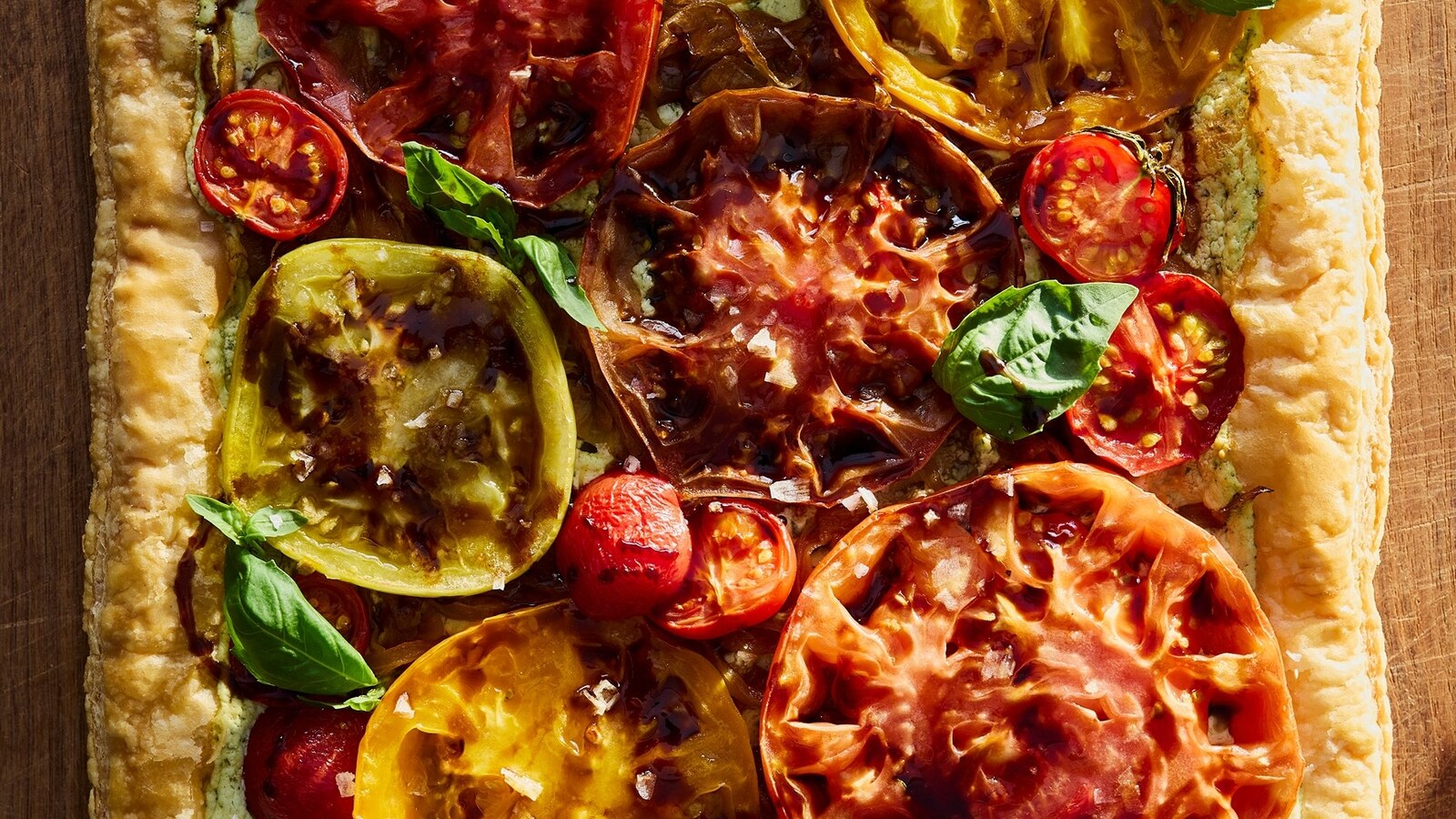 A tomato and caramelized onion puff pastry tart.