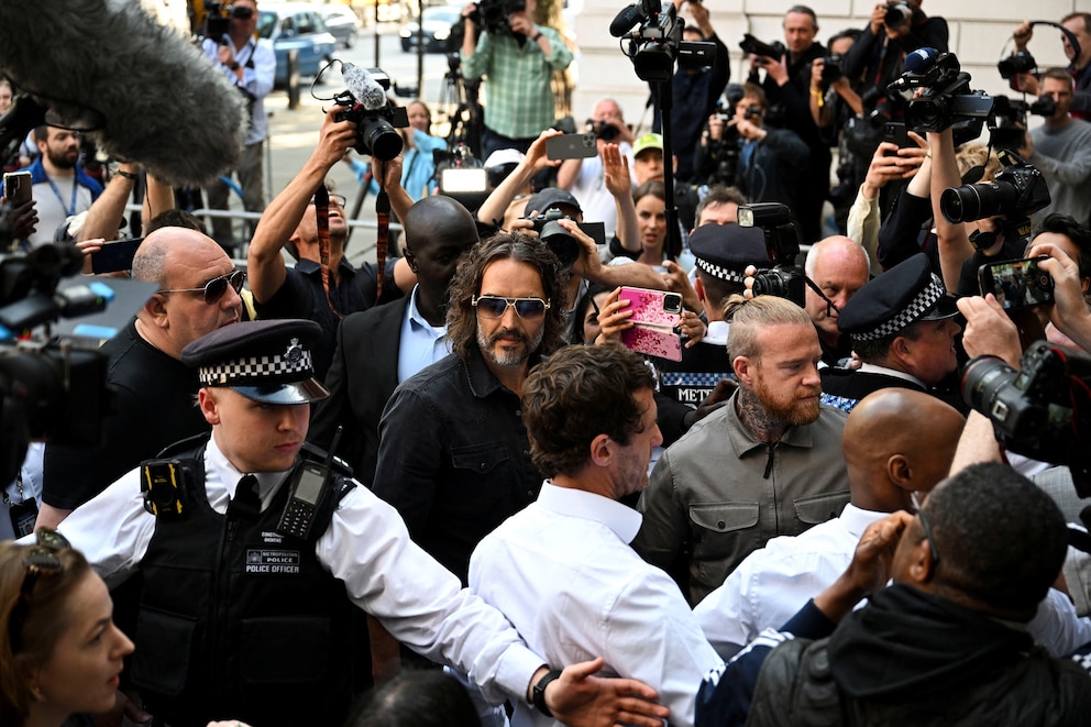 PHOTO: British actor and comedian Russell Brand appears at Westminster Magistrates' Court, in London