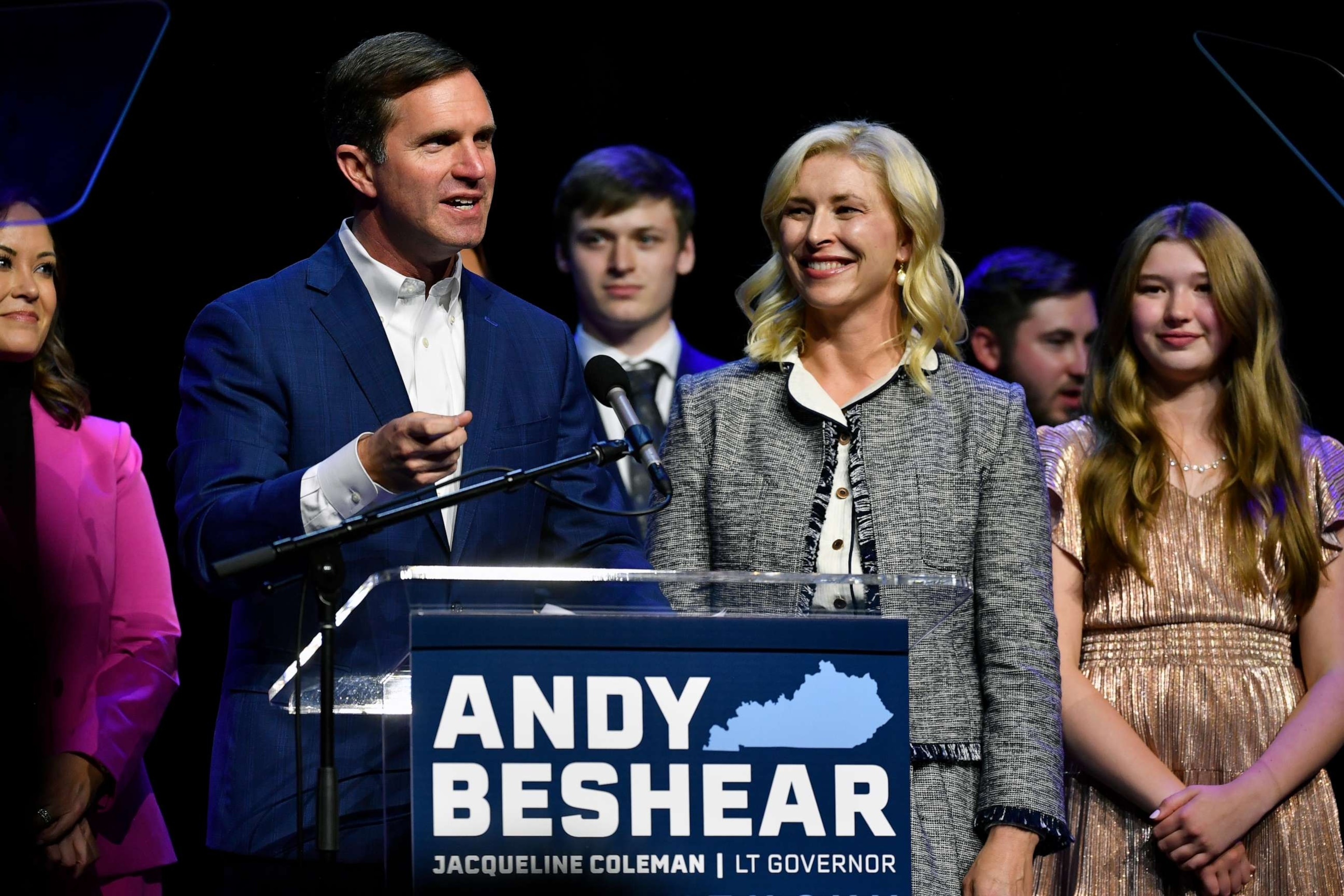 PHOTO: Kentucky Gov. Andy Beshear speaks during an election night rally after he was elected to a second term in Louisville, Ky., Nov. 7, 2023. At right is his wife Britainy Beshear.