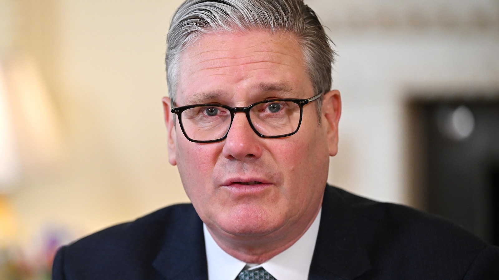 Senior British official resigns over Mandelson appointment but Starmer insists he won't go