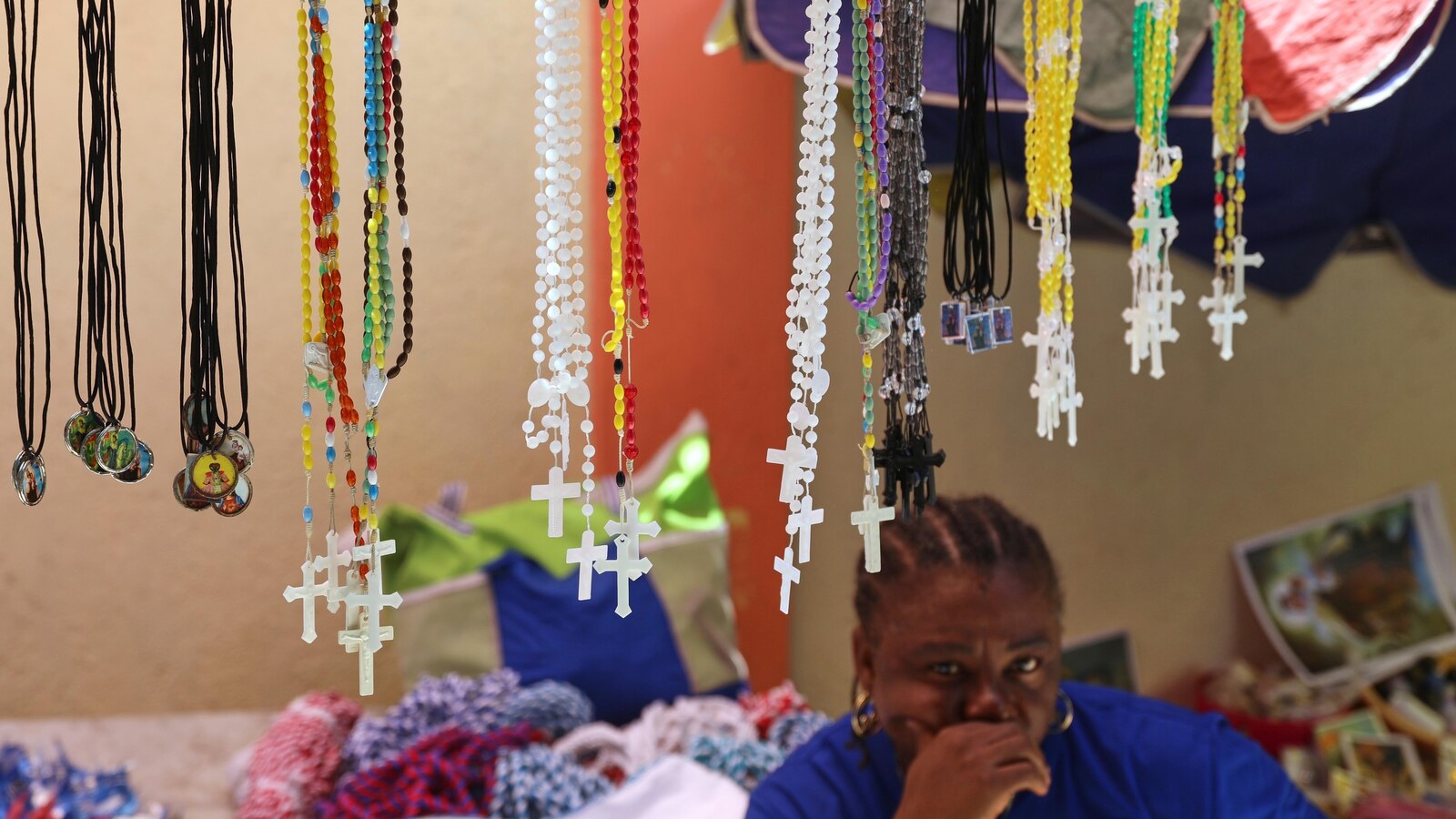 Thousands of Haitians mark annual pilgrimage far from a sacred waterfall surrounded by gangs