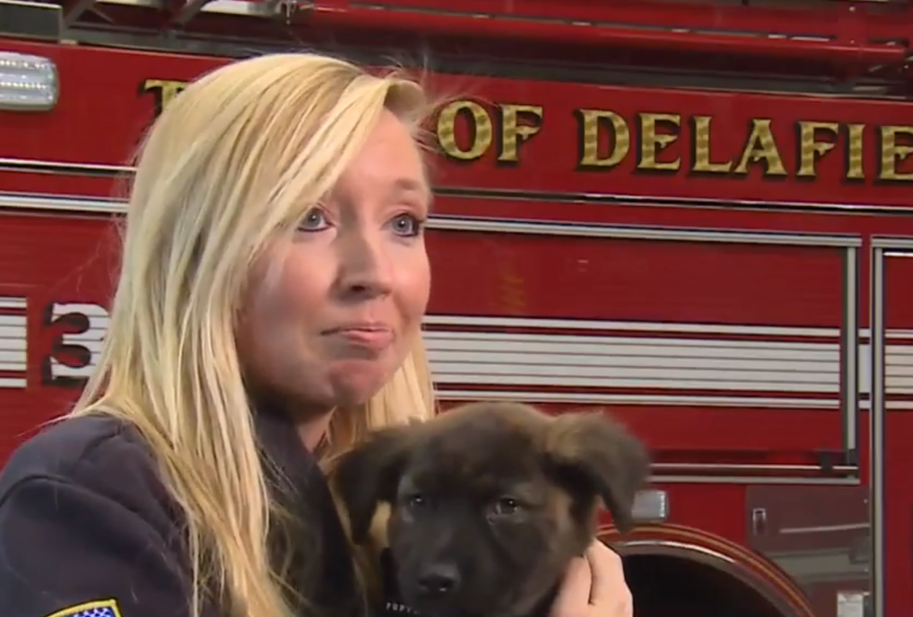 PHOTO: Amber Christian, a firefighter and paramedic with Lake Country Fire Rescue, with Artemis.