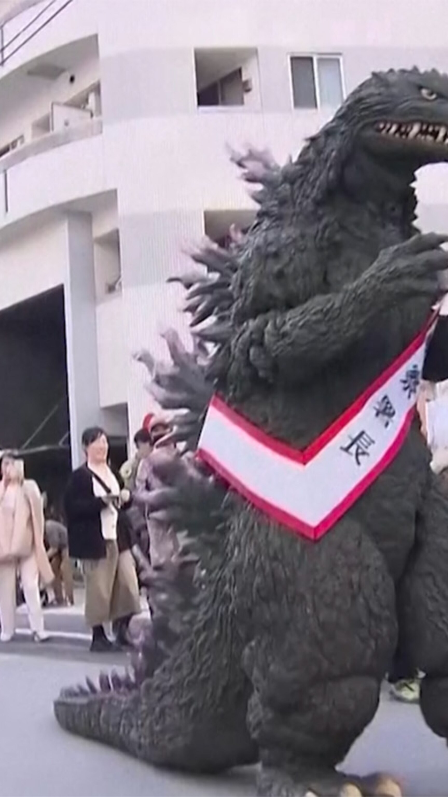Video 'Godzilla' hits Tokyo streets to promote traffic safety
