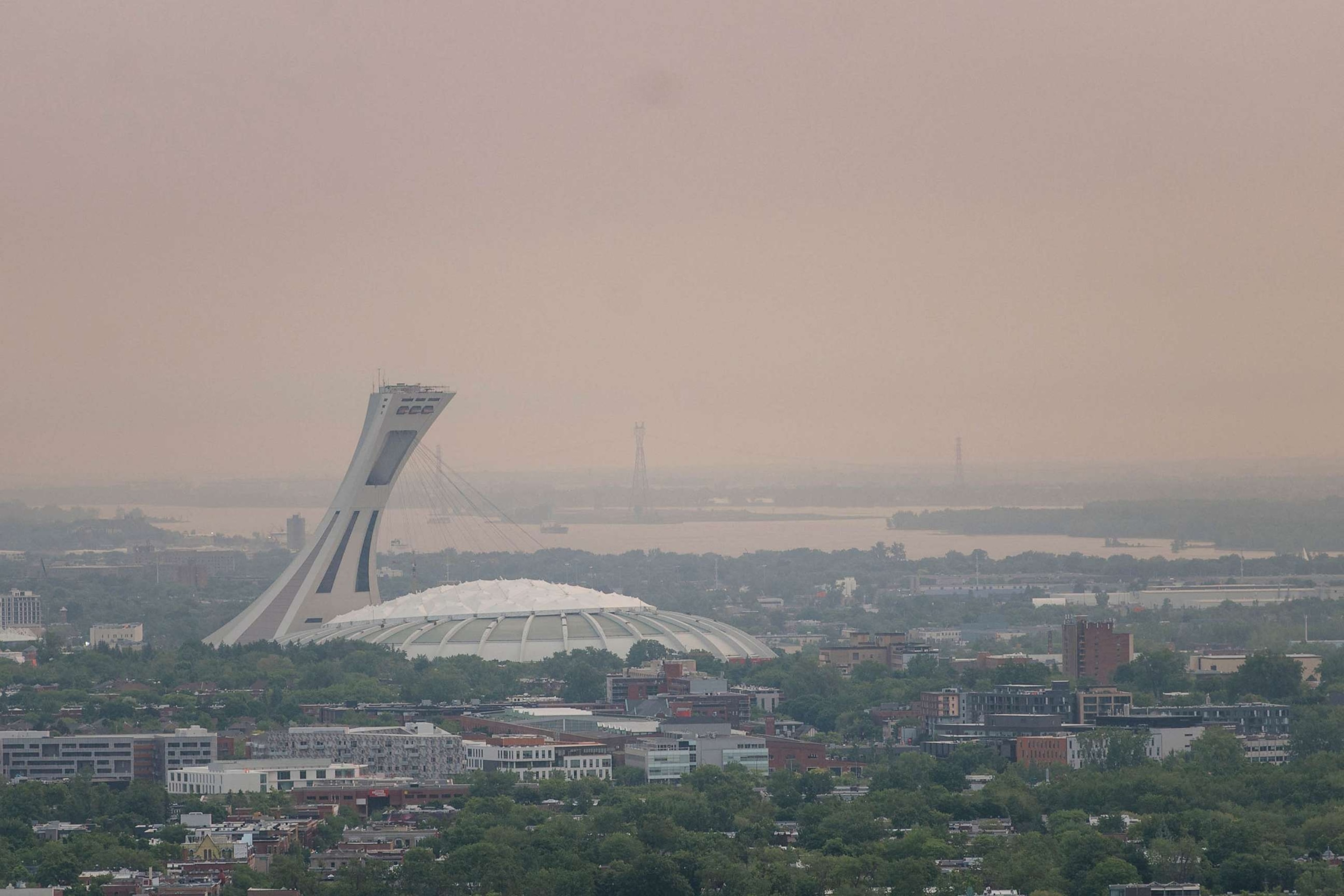 PHOTO: The Olympic Stadium as Montreal is shrouded in smog, June 6, 2023, in Montreal, Canada.