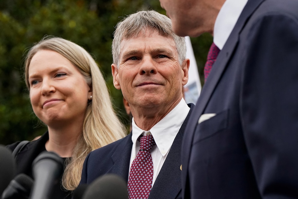 PHOTO: Former U.S. Olympic canoeist David Hearn stands with his lawyer as they speak to reporters following Hearn's arraignment on a felony destruction of property charge related to the Lincoln Memorial Reflecting Pool in Washington, July 9, 2026.