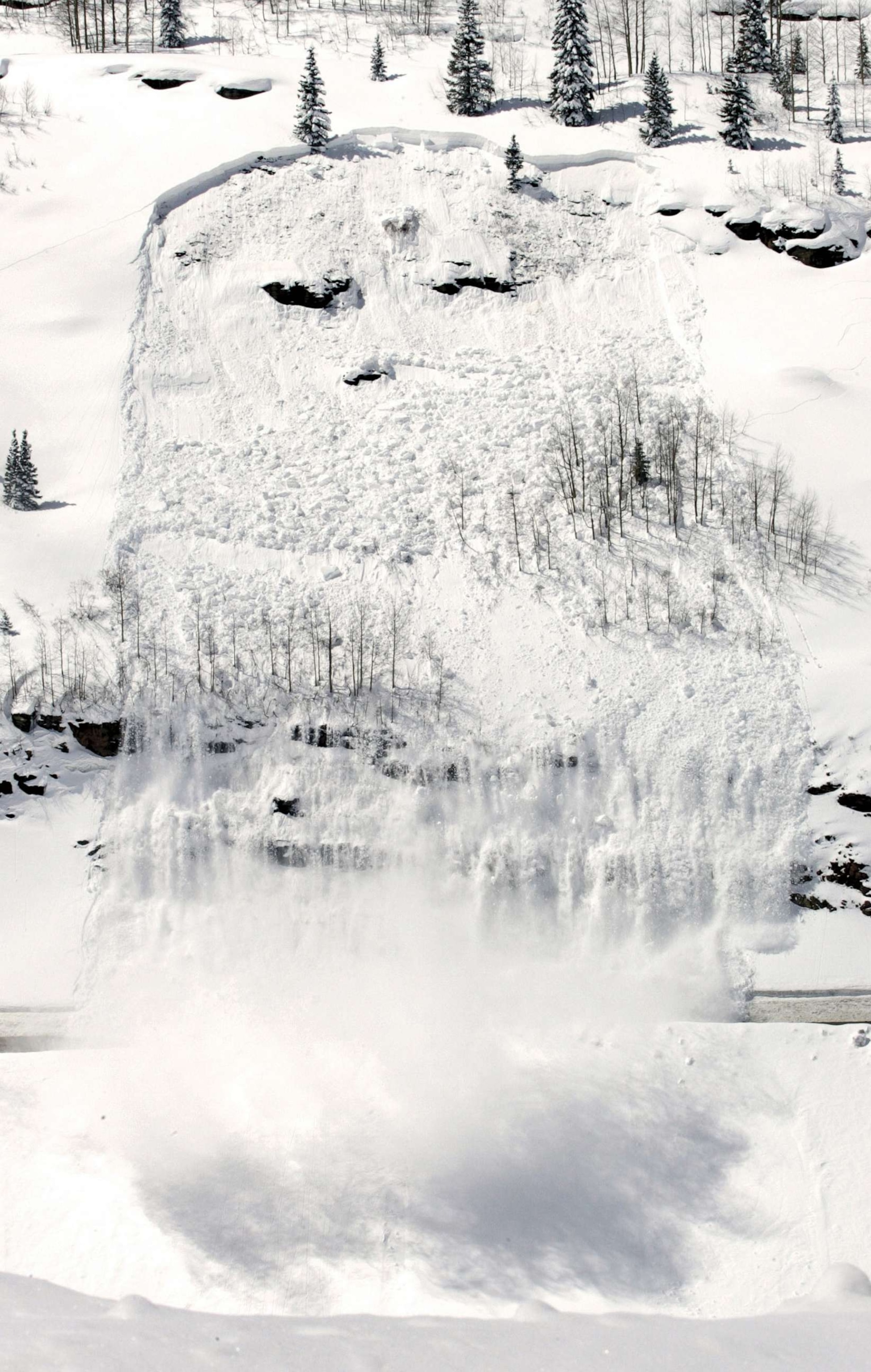 PHOTO: In this March 30, 2006 file photo, an avalanche set off by the Colorado Department of Transportation slides down over U.S. Highway 550 south of Silverton, Colo.