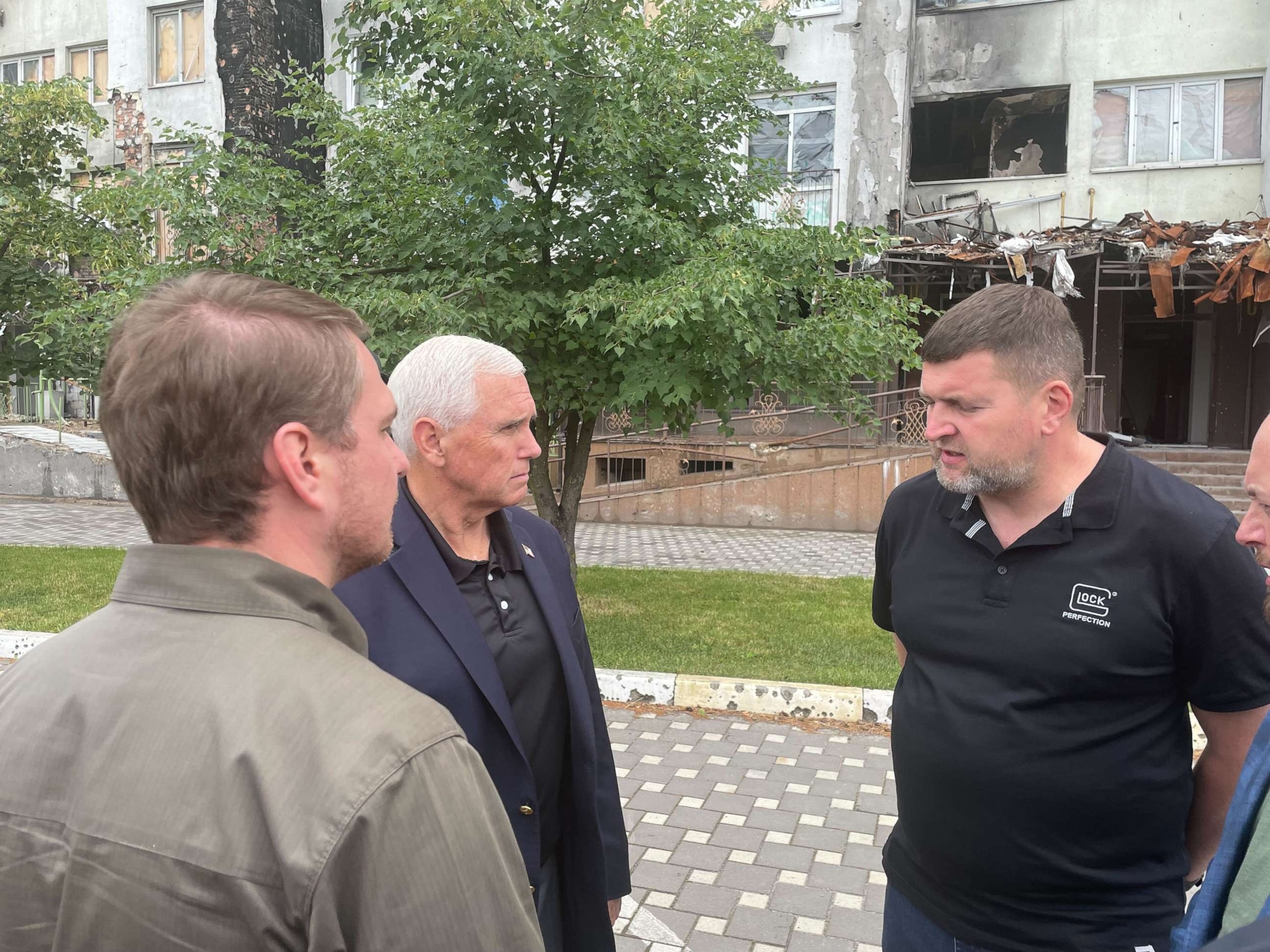 PHOTO: Former Vice President Mike Pence meets with local officials in Irpin, Ukraine, and surveys damage from Russia's invasion on June 29, 2023.