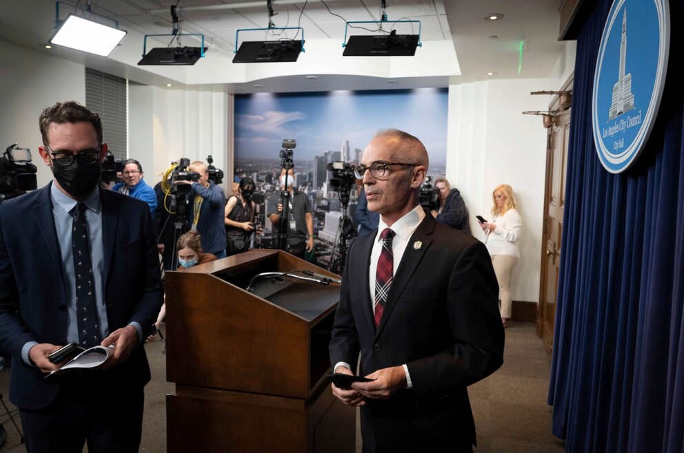 PHOTO: Acting Los Angeles City Council President Mitch O'Farrell, right, leaves a news conference, Oct. 13, 2022, in Los Angeles.