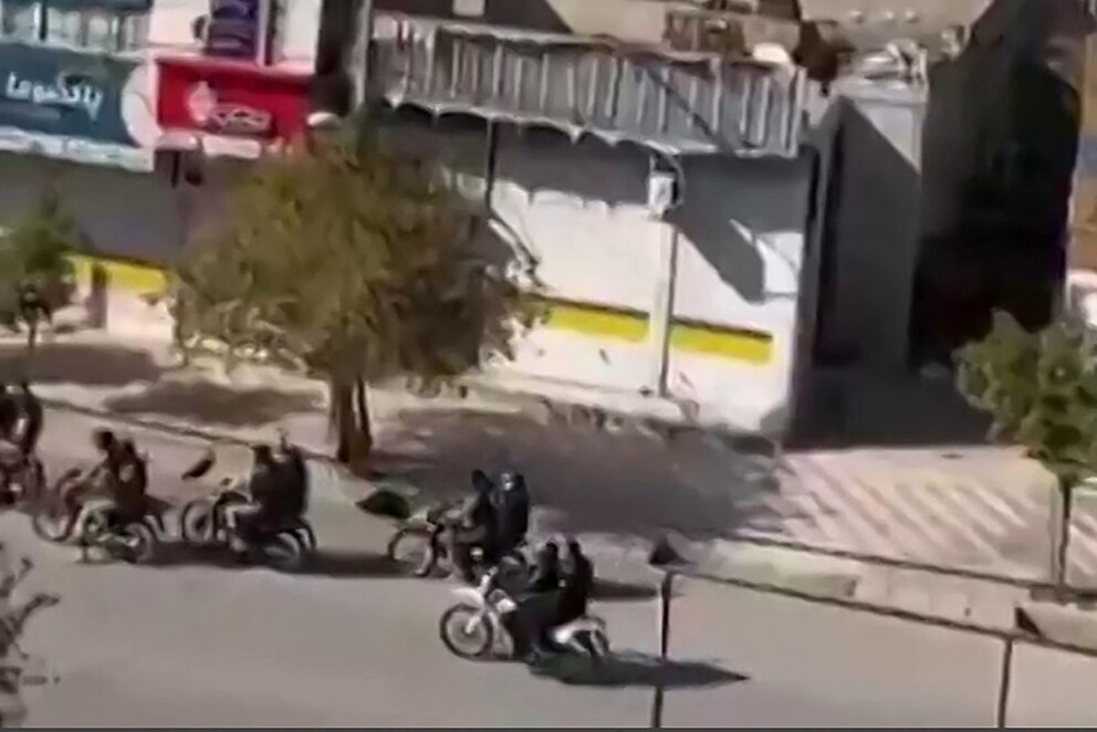 PHOTO: This video grab taken from UGC images on Jan. 11, 2026 and verified by AFPTV teams in Paris on Jan. 11, shows Iranian armed security forces on motorcycles firing ammunition in the air on Hazraty street in Kazerun, a city west of Shiraz.