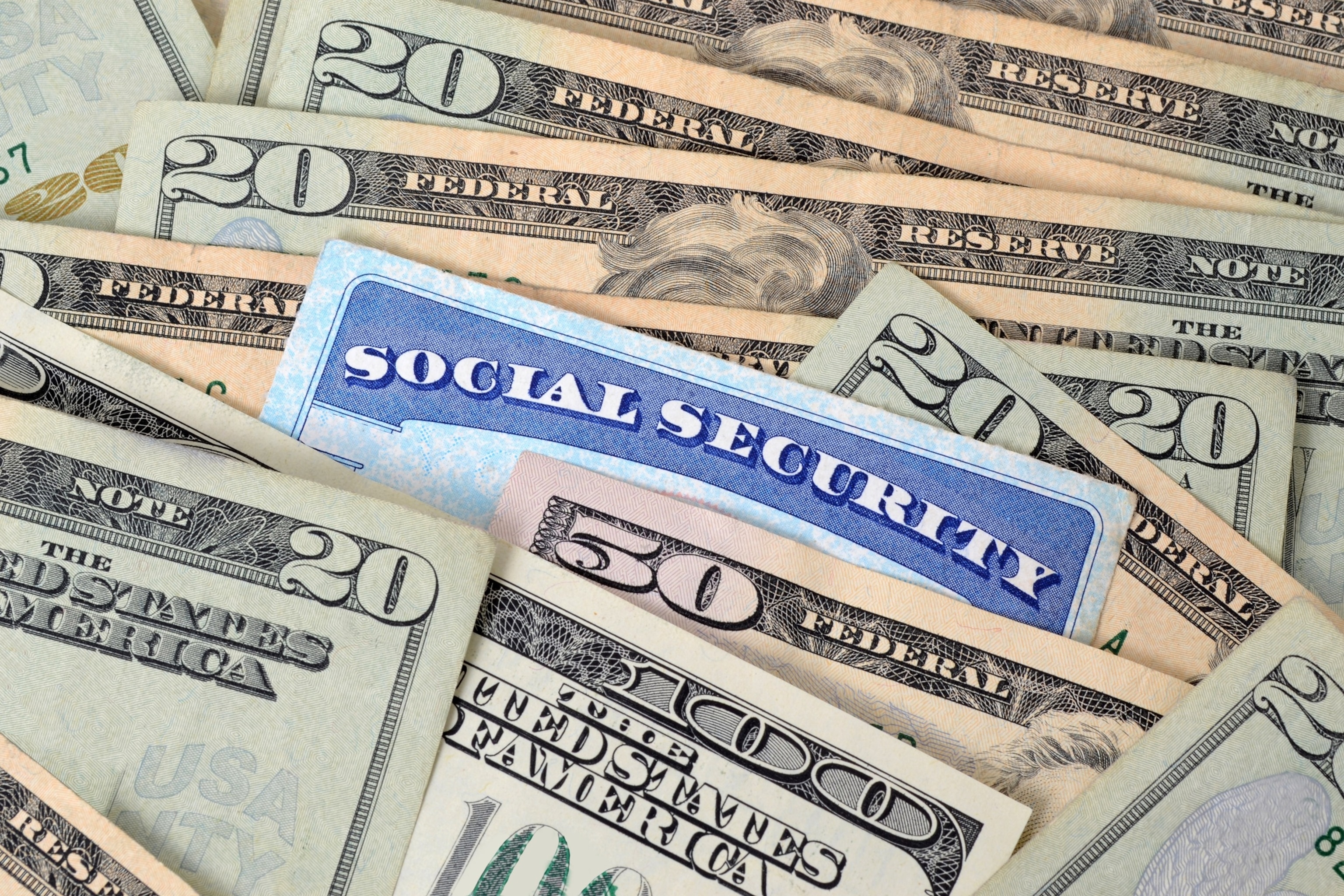 PHOTO: a social security card and money