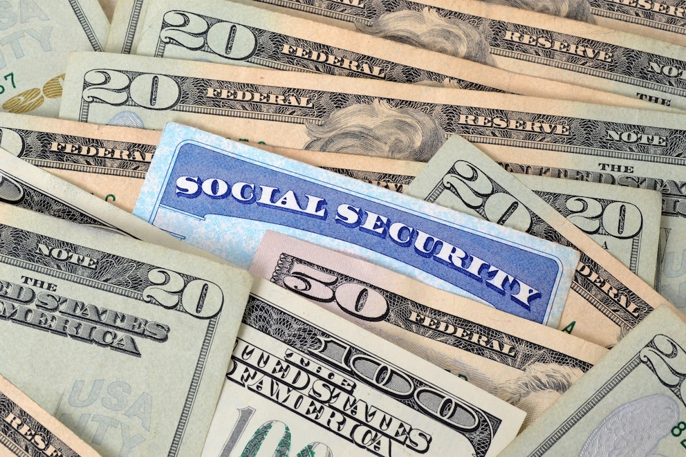PHOTO: a social security card and money