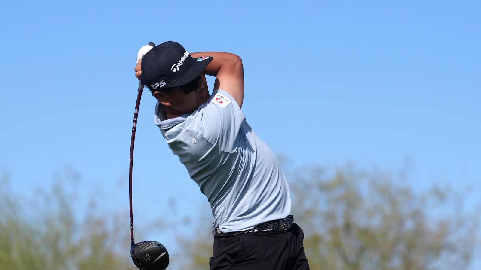 Hisatsune chips in for birdie after water ball, shoots 63 to take 2nd-round lead at Phoenix Open