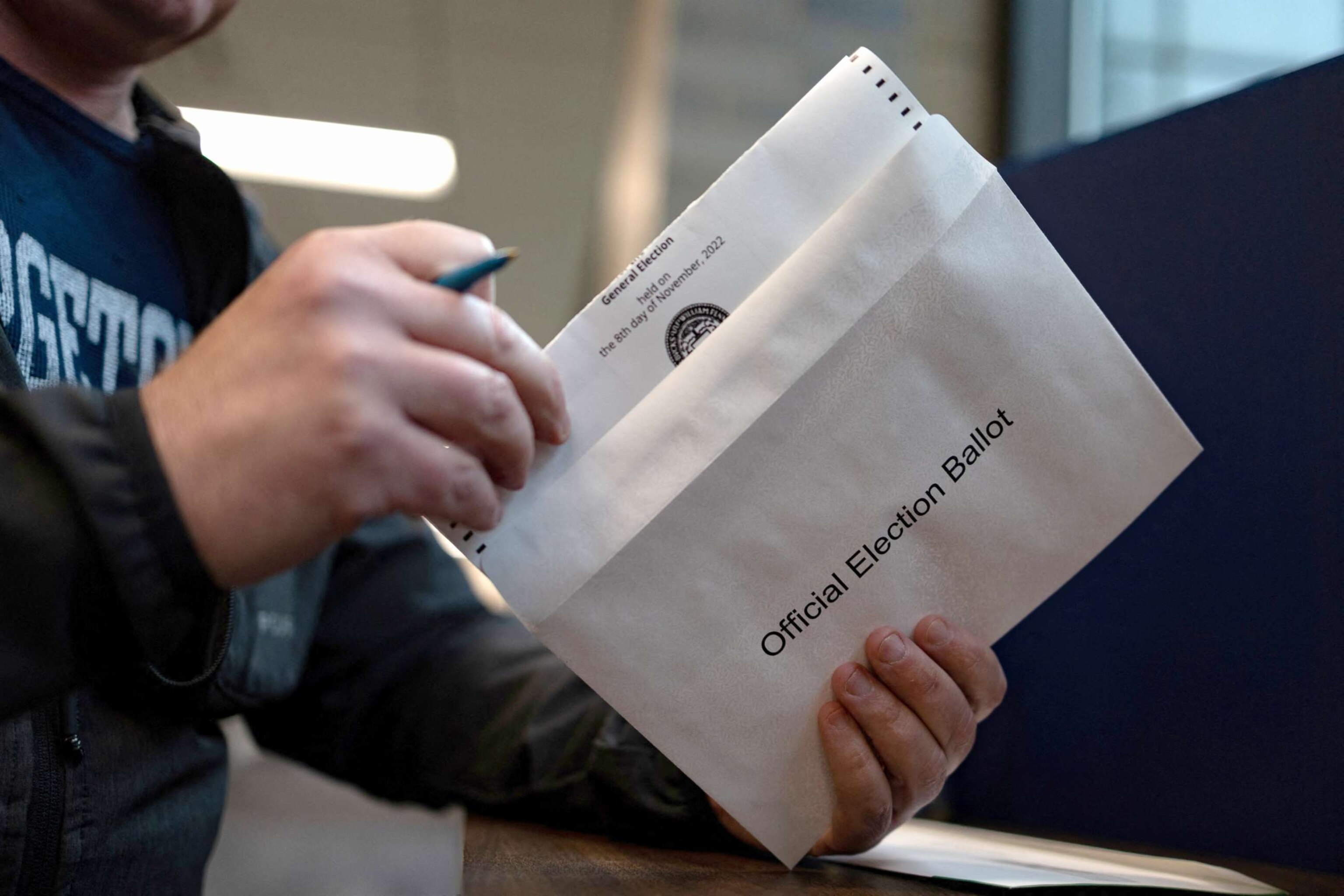 PHOTO: Tom Miller, 52, votes "On Demand" using an absentee or mail-in ballot in Doylestown, Pennsylvania, October 31, 2022.