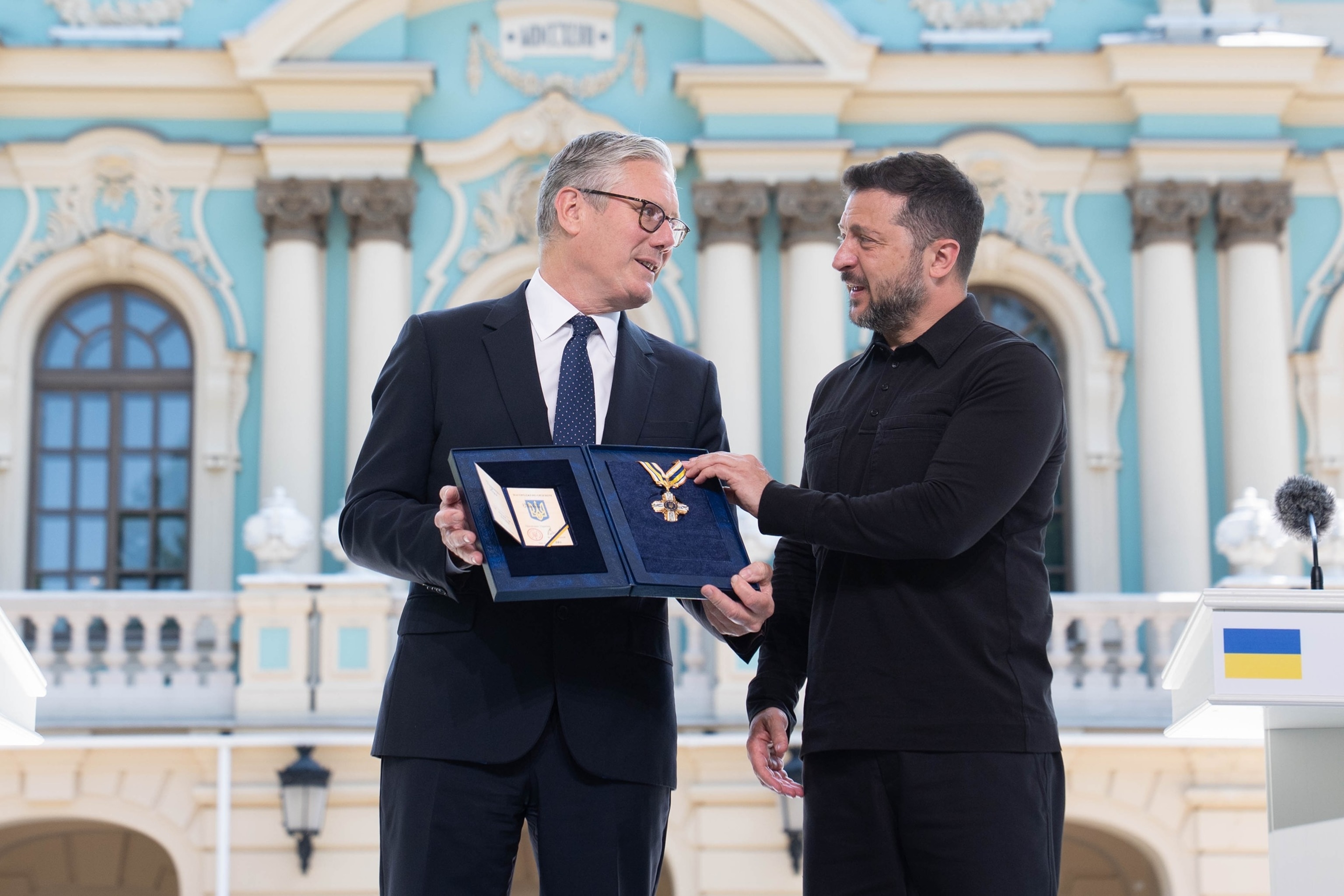 PHOTO: Ukrainian President Volodymyr Zelenskyy (R) presents The Order of Freedom to British Prime Minister Keir Starmer in the gardens of the Presidential Palace in Kyiv, Ukraine, on July 16, 2026, as Starmer visited Ukraine.