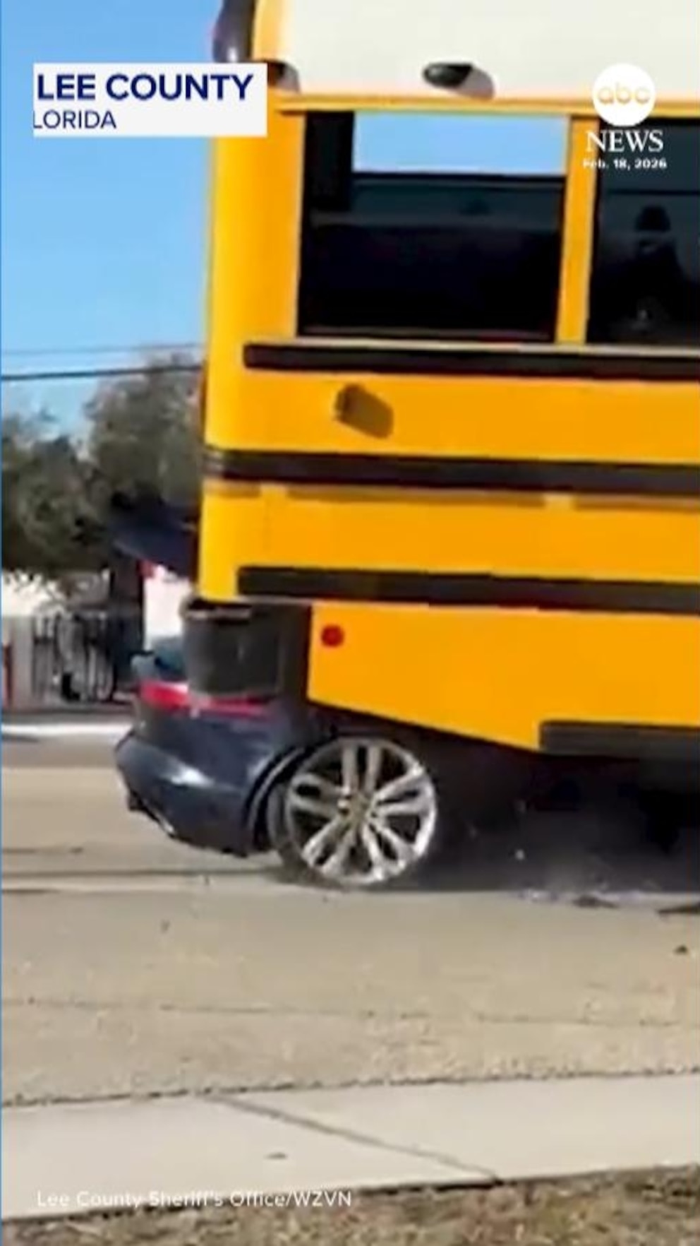 WATCH:  Sports car slams into school bus in Florida