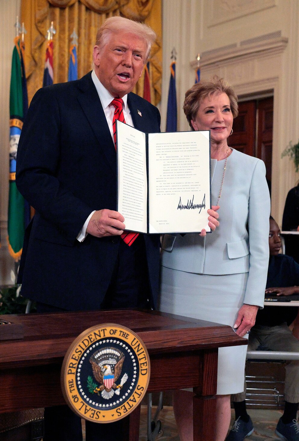 PHOTO: President Donald Trump stands with Secretary of Education Linda McMahon after signing an executive order to reduce the size and scope of the Education Department on March 20, 2025, in Washington, D.C.