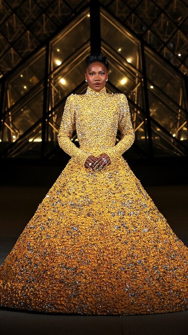 Doechii glows in gold Valentino dress at Louvre fashion dinner - ABC News Doechii glows in gold Valentino dress at Louvre fashion dinner - ABC News