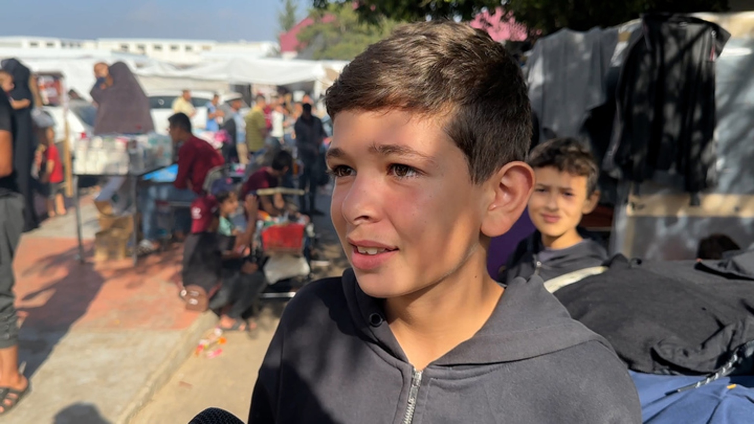 PHOTO: Mohammad, a Palestinian boy staying at the UN Relief and Works Agency shelter in Khan Yunis in southern Gaza.