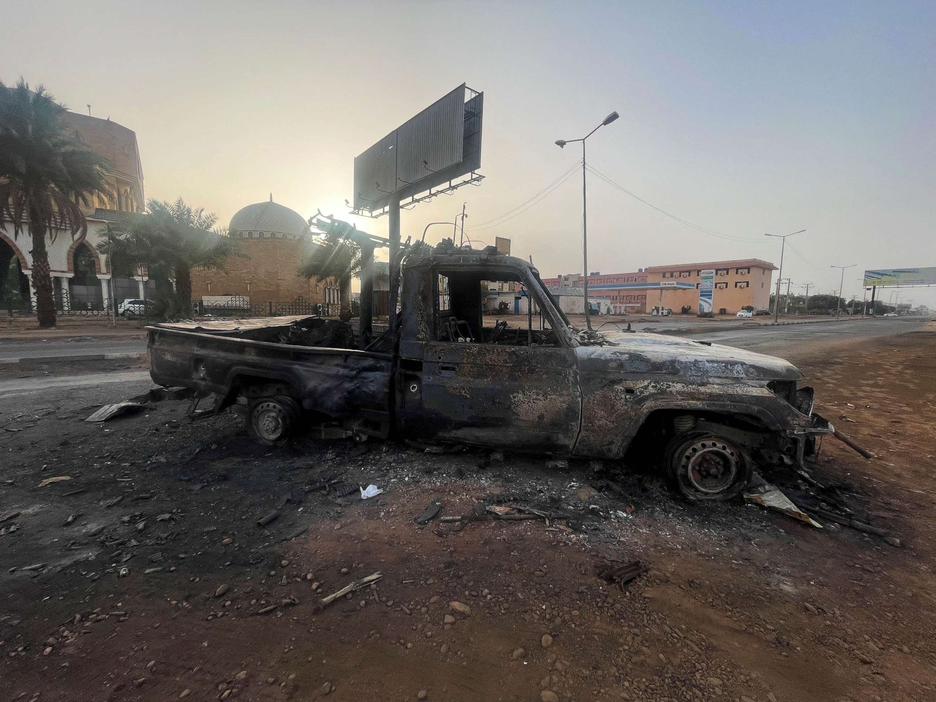 PHOTO: A burned vehicle is seen in Khartoum, Sudan, April 26, 2023.