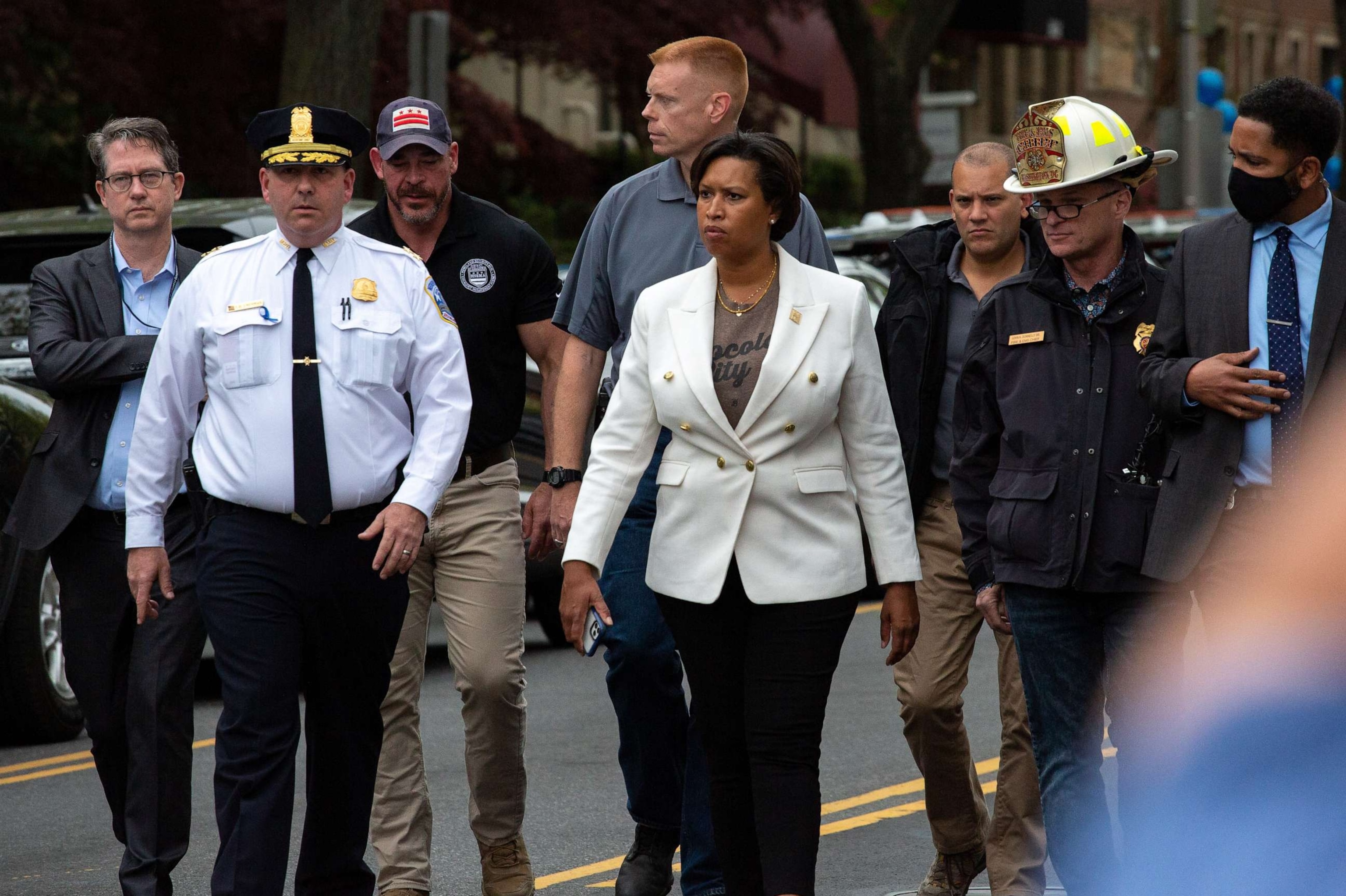 PHOTO: Mayor Muriel Bowser and Metropolitan Police Department Assistant Chief Stuart Emerman walk to a press conference after multiple people were injured in a shooting near the Edmund Burke School in Washington, April 22, 2022.