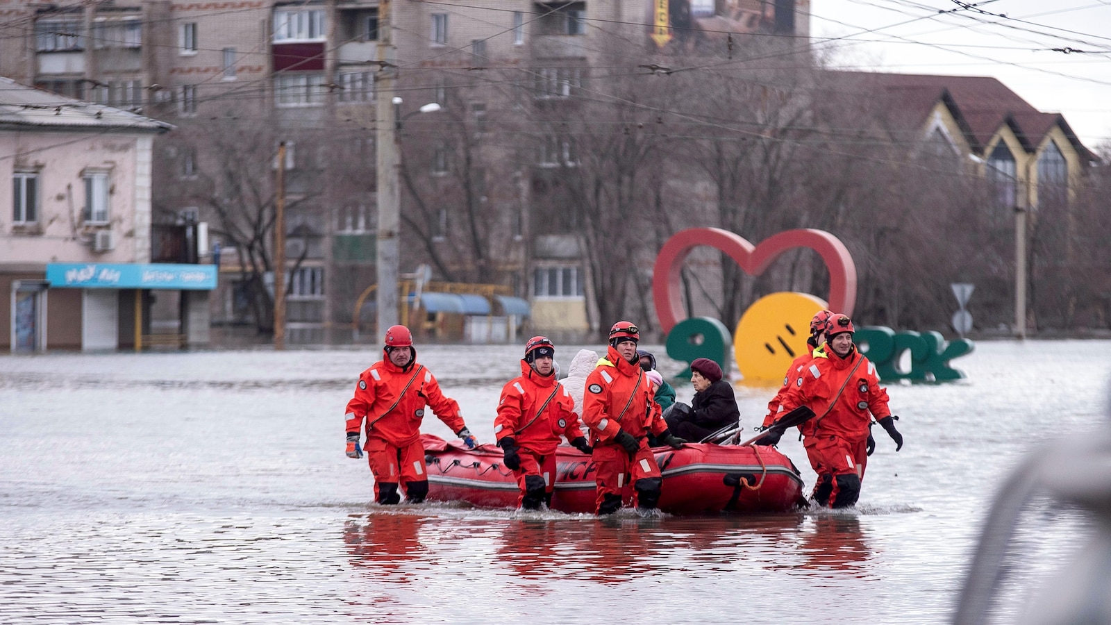 Russians stage a rare protest after a dam bursts and homes flood near the Kazakh border