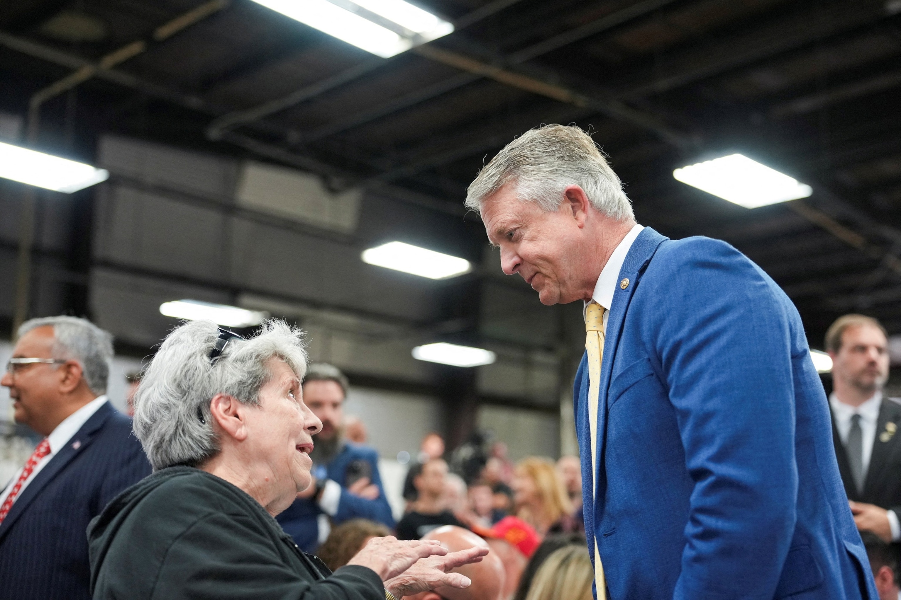 Sen. Roger Marshall speaks with a woman during an event with Vice President JD Vance at Milbank Manufacturing Company in Kansas City, Missouri, May 18, 2026.Eric Lee/Reuters