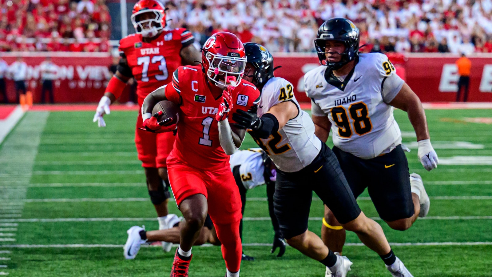Dampier, Parker star as Utah routs Idaho 66-14 in Scalley's debut