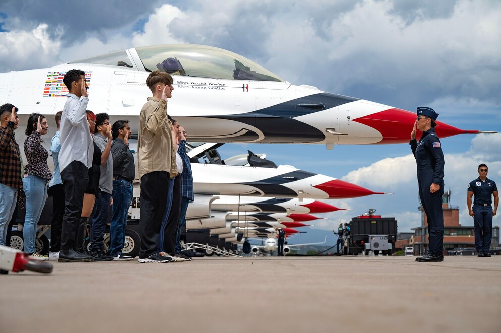 PHOTO: Captain Natalee Winton administers the oath of enlistment to 13 U.S. Space Force and USAF delayed entry program members during a swear-in ceremony at Peterson Space Force Base, Colorado, May 29, 2024. 
