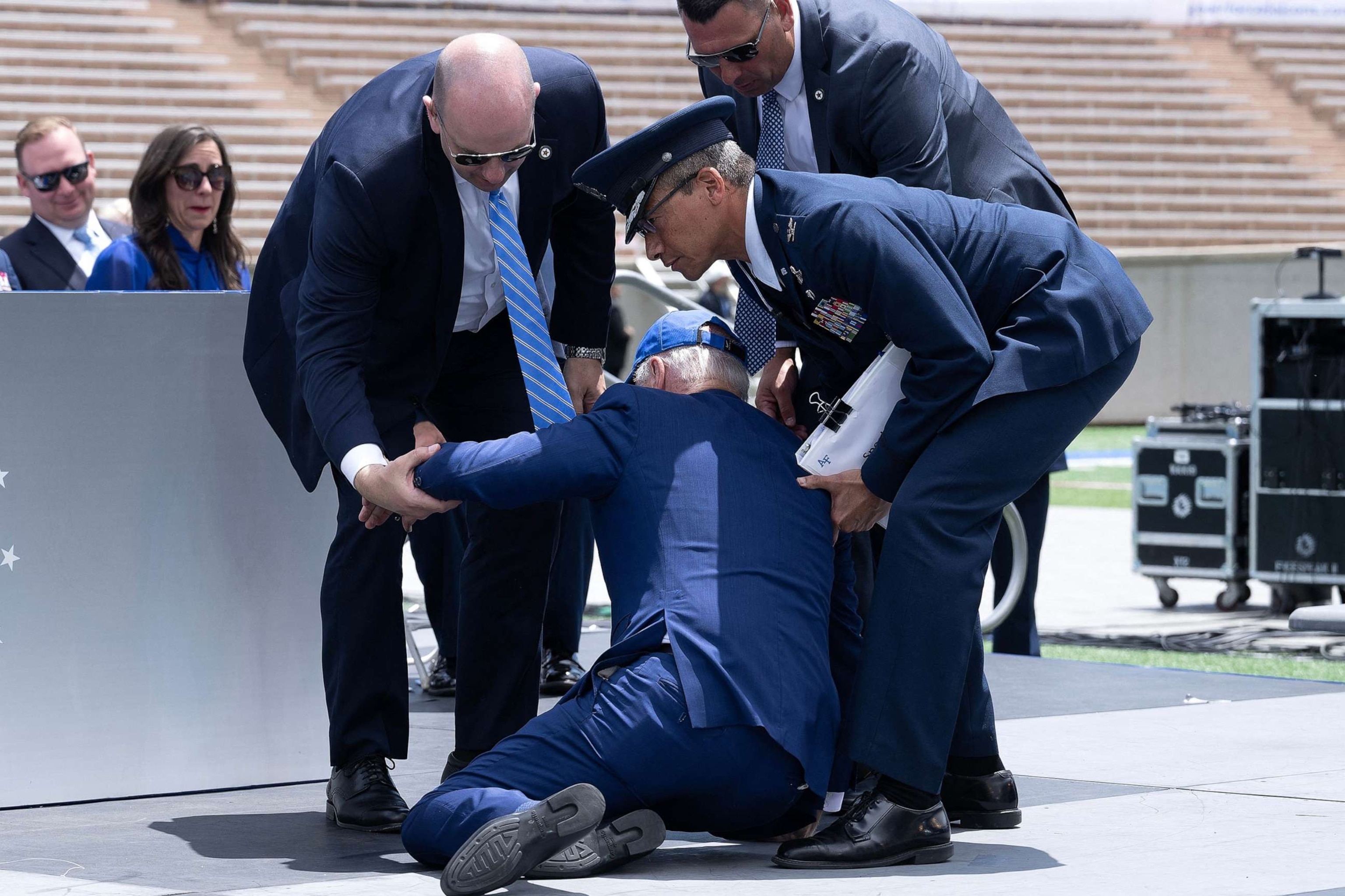 PHOTO: In this June 1, 2023, file photo, President Joe Biden is helped up after falling during the graduation ceremony at the United States Air Force Academy, just north of Colorado Springs in El Paso County, Colorado.