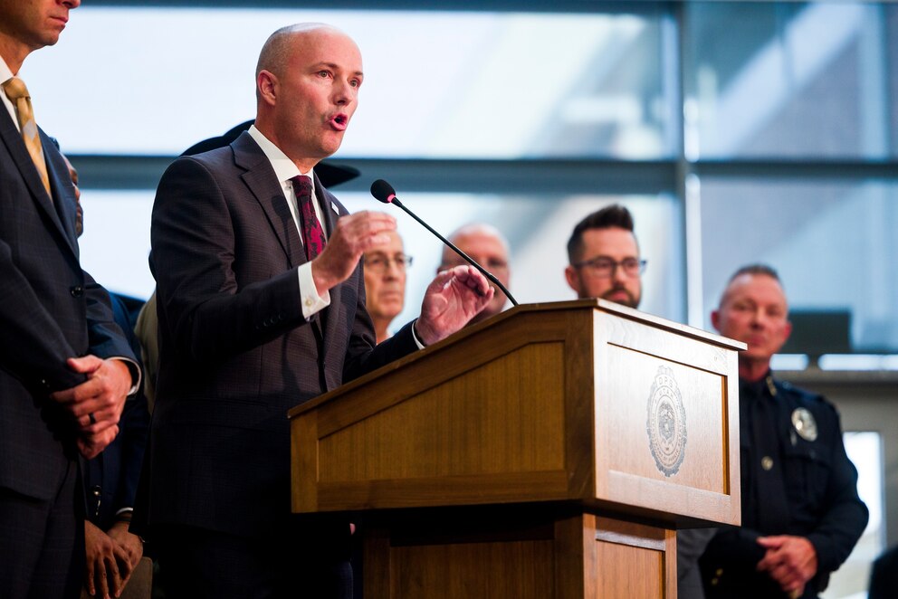 PHOTO: Utah Gov. Spencer Cox speaks at a press conference flanked by FBI director Kash Patel following the fatal shooting of political activist Charlie Kirk during an event at Utah Valley University on September 12, 2025 in Orem, Utah.